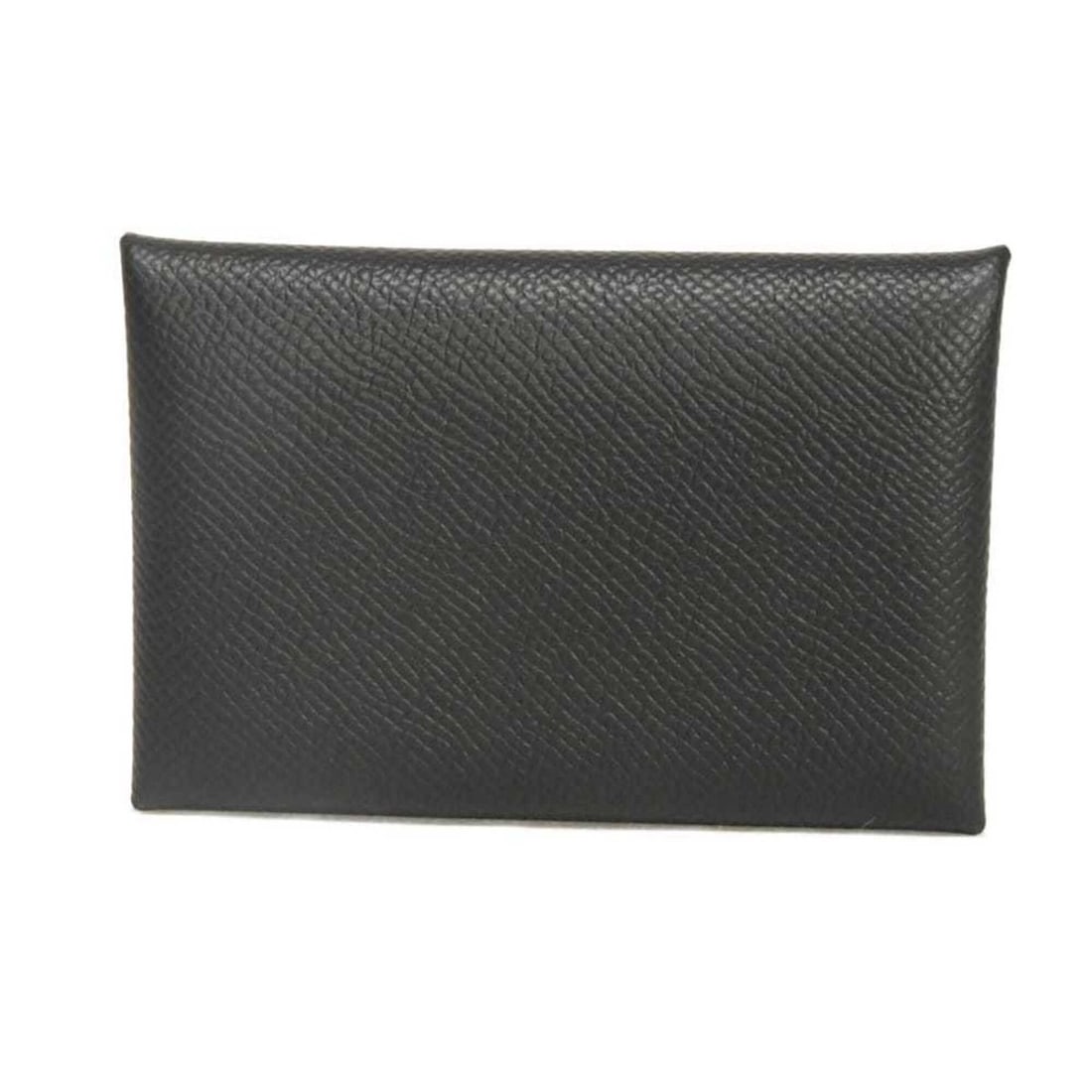 Hermes Calvi Card Case, featuring a foil-stamped logo, pressed calfskin leather, snap button: --- Catalog ---Category: DesignType: Card caseColor: BlackGender: Men,WomenMaterial: Epsom leather Category: GeneralBrand: HermesCategory: Physical PropertiesSize (HxWxD): 7cm x 10.5cm x 1.5cm / 2.75'