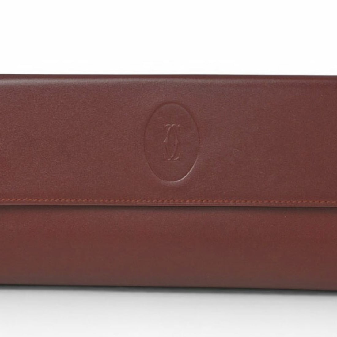 Cartier wallet/tri-fold wallet, long Must de Cartier, Bordeaux.: --- Catalog ---Category: SizeSize (HxWxD): 9.8cm x 18.5cm x 2cm / 3.85'' x 7.28'' x 0.78''Category: DesignType: Long wallet (bi-fold)Color: BordeauxGender: Unisex,Women,MenClosure: Snap fastenerMateri