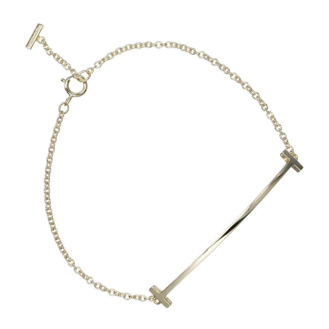 Tiffany & Co. T Smile Bracelet, 18K Yellow Gold, approx. 2.6g.: --- Catalog ---Category: SizeLength: 16.3cm / 6.41''Category: DesignType: Charm braceletGender: WomenMaterial: Yellow gold (18K)Category: GeneralBrand: Tiffany--- Item List ---Section: ConditionRankin
