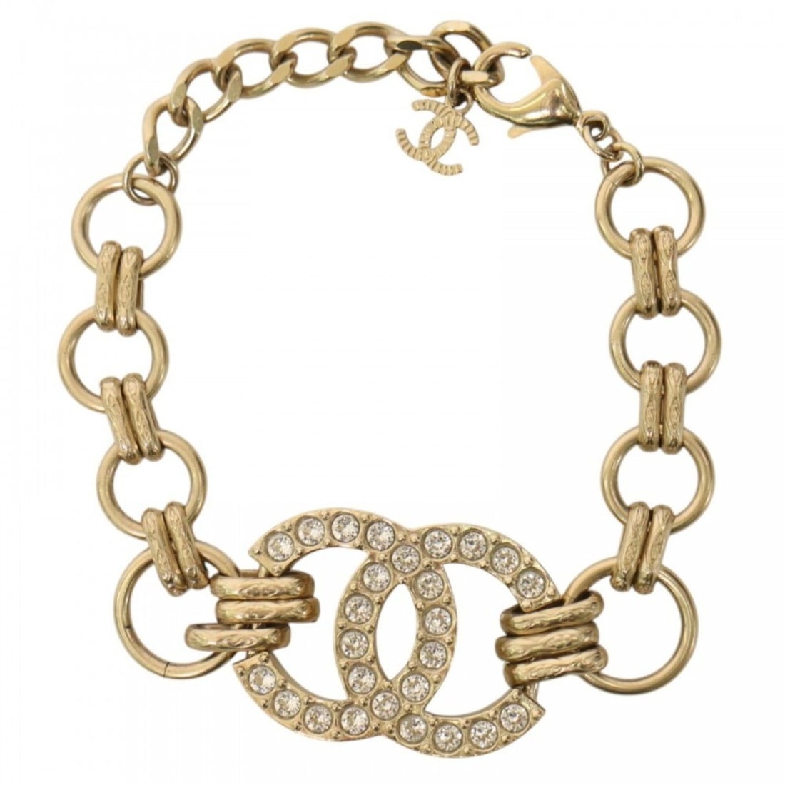 Chanel bracelet for women, Coco Mark design, adjustable clasp, CHANEL GP rhinestone, F24B gold,: --- Catalog ---Category: SizeWidth: 1.3cm / 0.51''Length: 19cm / 7.48''Weight: 23.3g / 0.82oz.Category: DesignType: Charm braceletColor: GoldStone: RhinestoneFinish: Gold platedGender: WomenCategory: 