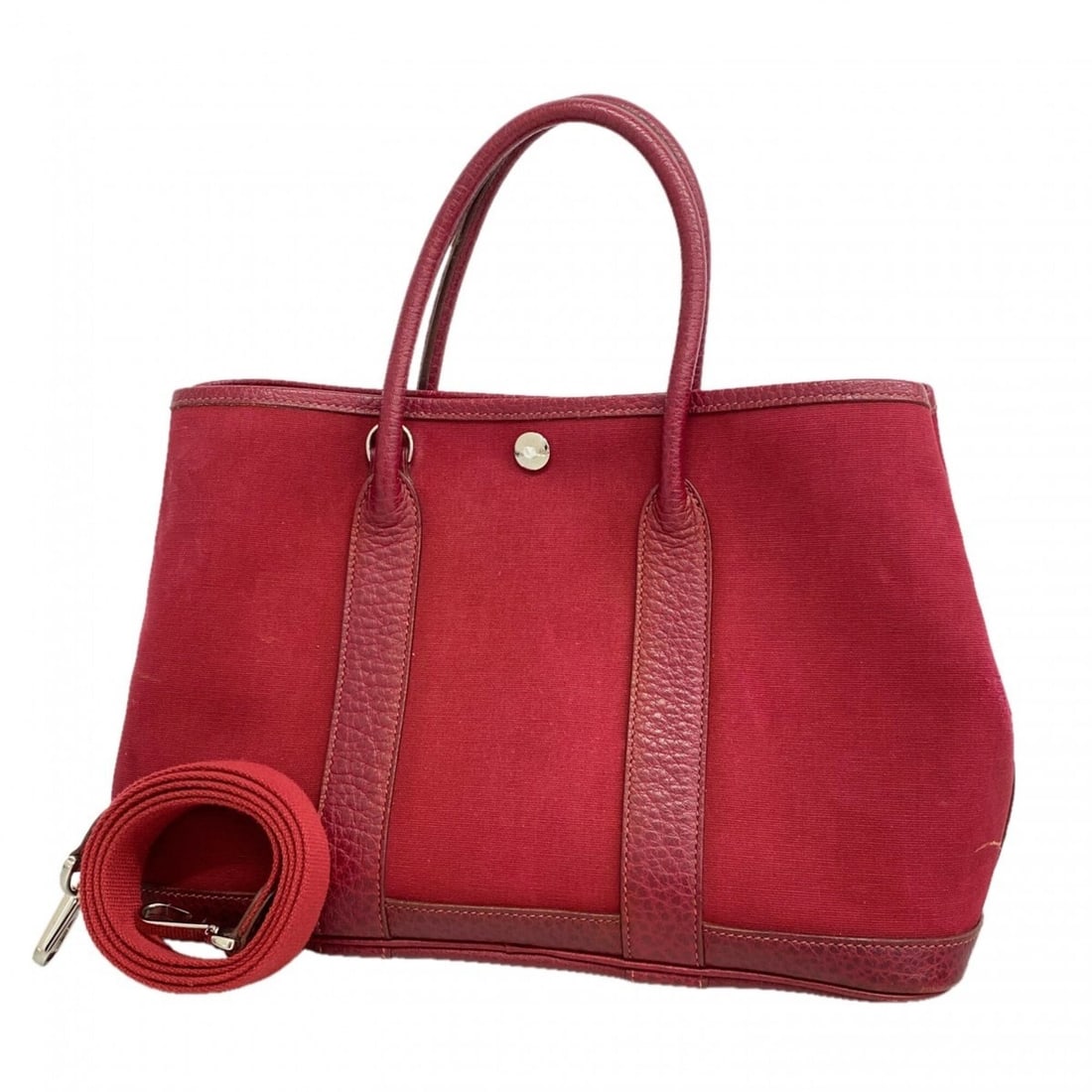 Hermes Garden TPM Toile Officier Red Handbag (?I stamp) 2-way bag for women: --- Catalog ---Category: SizeSize (HxWxD): 21.5cm x 30.5cm x 13.5cm / 8.46'' x 12'' x 5.31''Category: DesignType: HandbagColor: Red colorGender: WomenMaterial: Toile officier Hardware Color: SilverCat