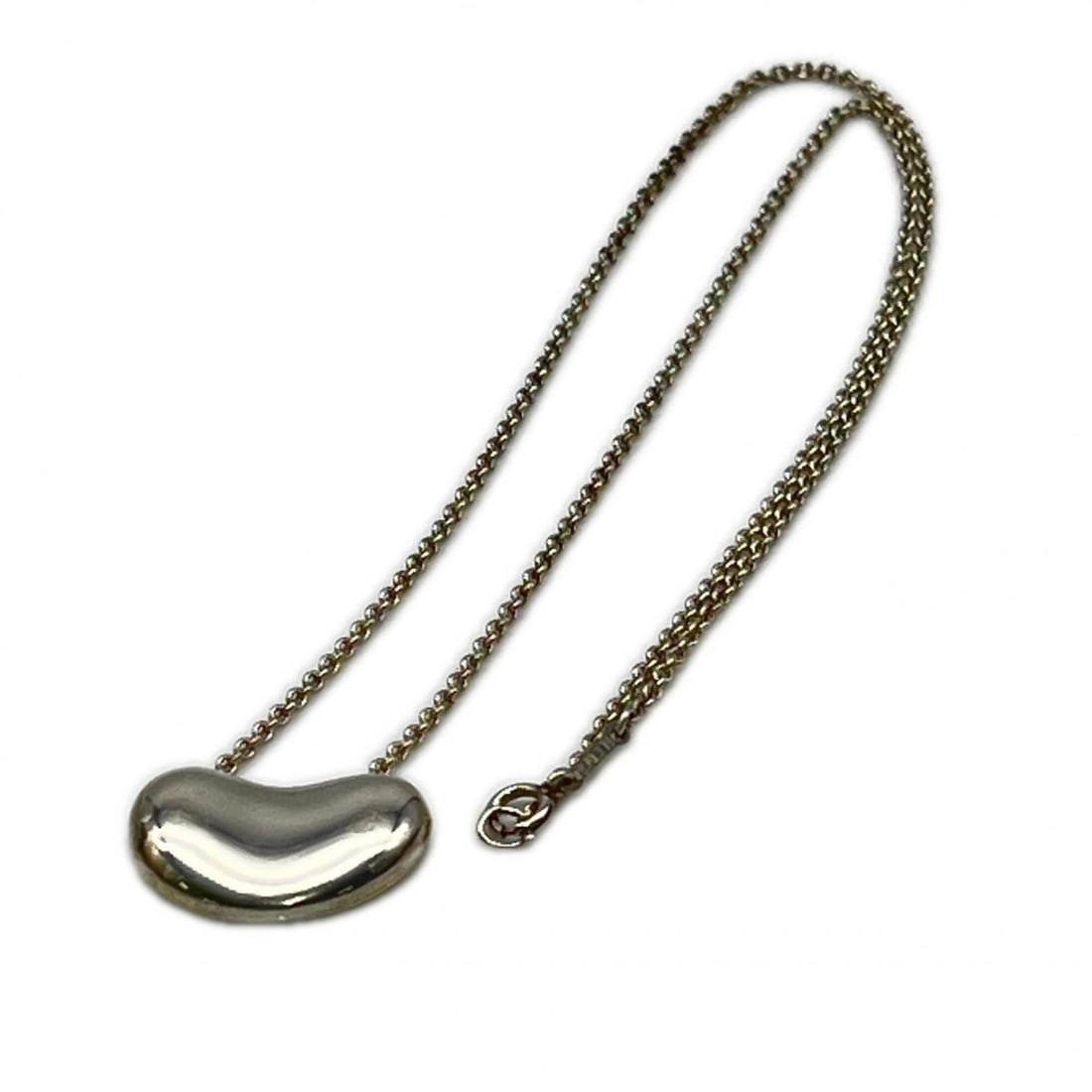 TIFFANY&Co. Elsa Peretti Bean Necklace SV925 - Women's: --- Catalog ---Category: SizeWeight: 11g / 0.38oz.Pendant Size: 12mm x 1.9mm / 0.47'' x 0.07''Neck Circumference: 40.6 cm / 15.98''Category: DesignColor: SilverGender: WomenMaterial: Silver 925Necklac