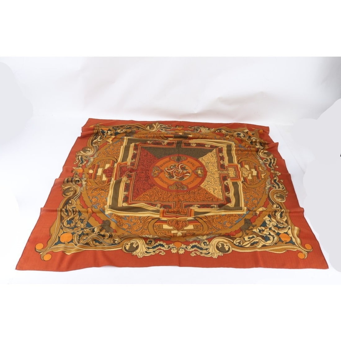 Hermes tagged Geant 140 ANIMAUX SOLAIRES (Animals of the Sun) Cashmere Silk Scarf/Muffler for Women: --- Catalog ---Category: SizeSize (LxW): 1.36m x 1.34m / 53.54'' x 52.75''Category: DesignType: ScarfColor: BrownGender: WomenMaterial: Cashmere , Silk Category: GeneralBrand: HermesCountry of Origin: