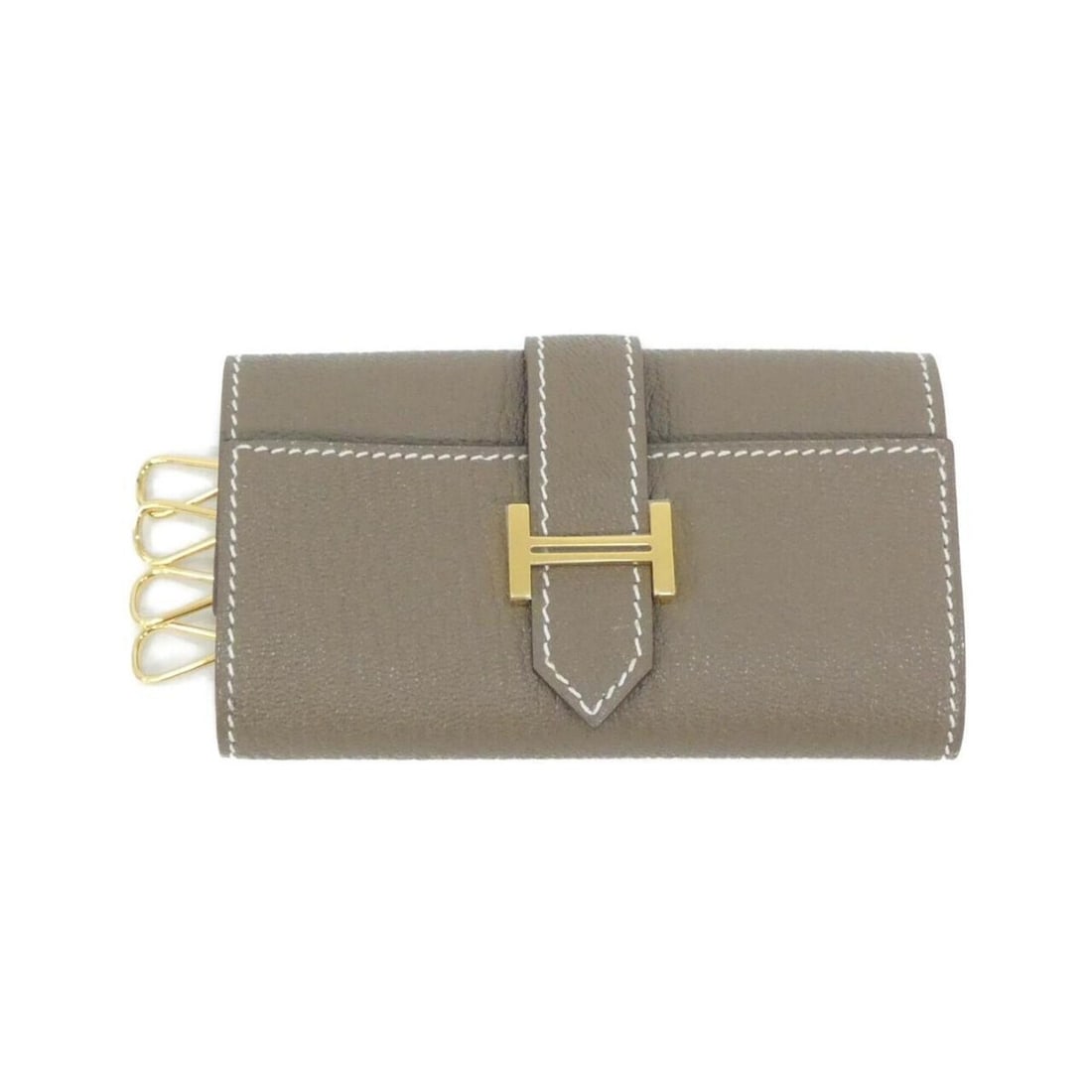 Hermes Bearn 047748CC Key Case: --- Catalog ---Category: DesignType: KeycaseColor: Etoupe grayGender: Men,WomenMaterial: Chevre leather Category: GeneralMPN: 047748CCBrand: HermesCategory: Physical PropertiesSize (HxWxD): 6cm x 10.5