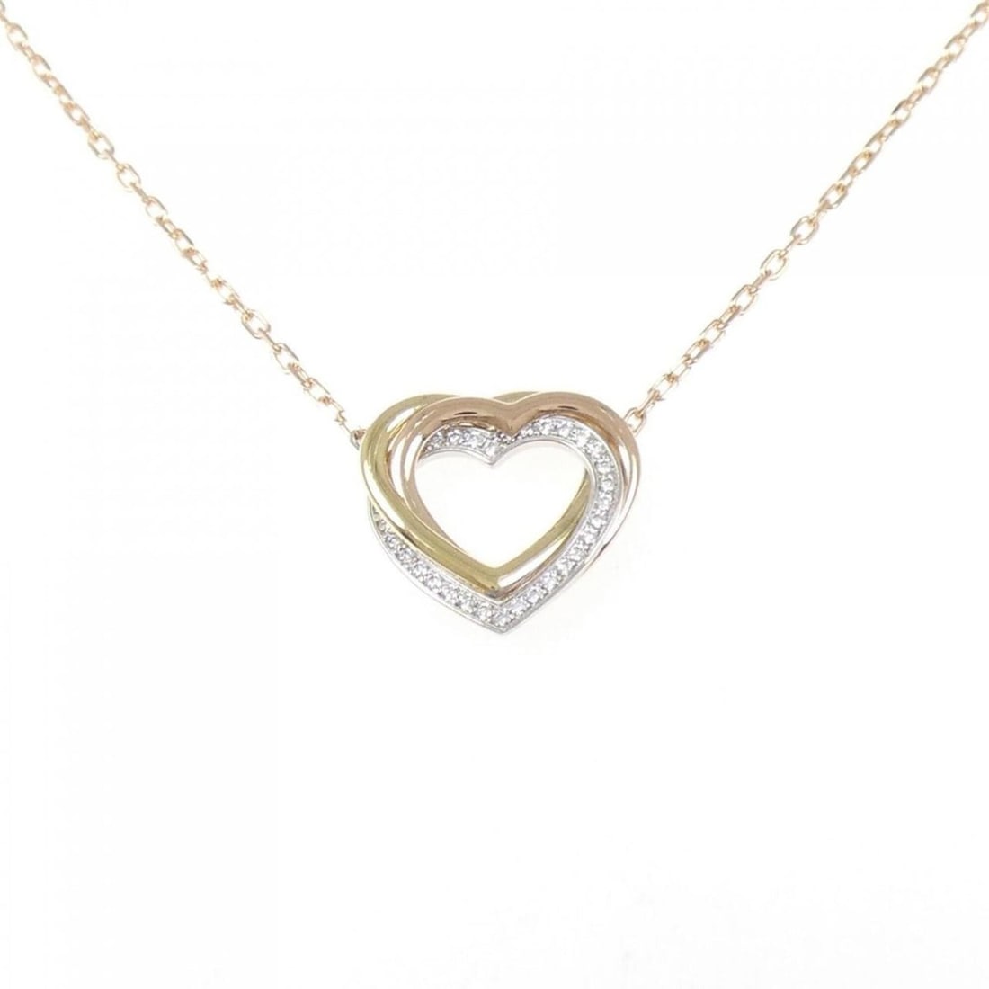 Cartier Trinity Heart Necklace: --- Catalog ---Category: SizePendant Size: 13.8mm x 14.4mm / 0.54'' x 0.56''Neck Circumference: 38 cm - 45 cm / 14.96'' - 17.71''Category: DesignGender: WomenMaterial: Pink gold (18K), White gold