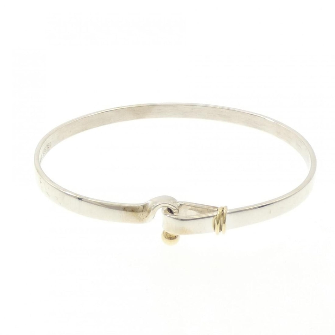Tiffany Hook & Eye Bangle: --- Catalog ---Category: SizeLength: 17.5cm / 6.88''Category: DesignType: BangleGender: WomenMaterial: Silver 925, Yellow gold (18K)Category: GeneralBrand: Tiffany--- Item List ---Section: ConditionRa