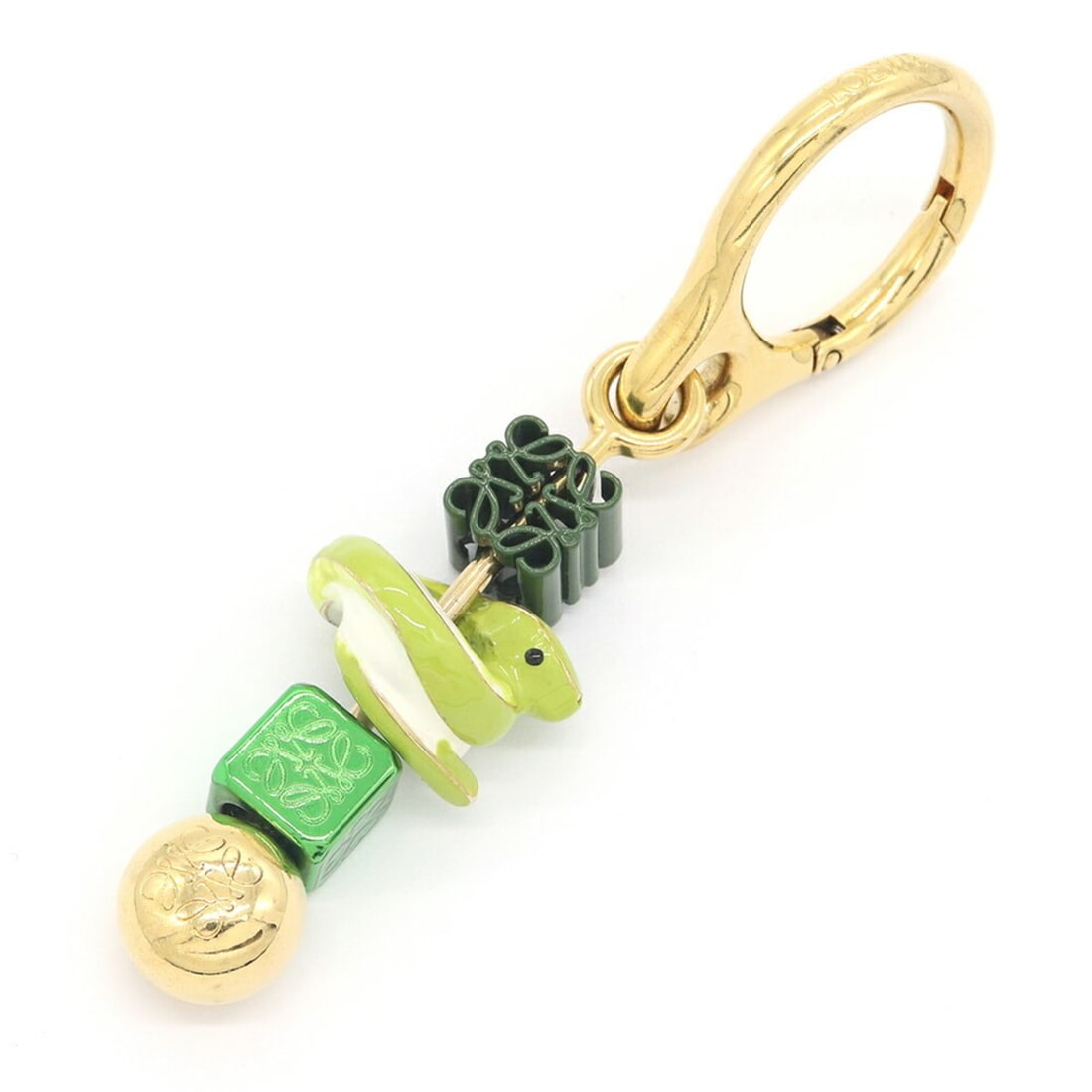 Loewe accessory bag charm, Anagram design, green and gold, key ring, keychain, snake, women's.: --- Catalog ---Category: SizeWeight: 67.9g / 2.39oz.Ring Diameter: 2.5cm / 0.98''Category: DesignType: KeyringColor: Gold, GreenGender: WomenCategory: GeneralBrand: LoeweCountry of Origin: Spain--- It
