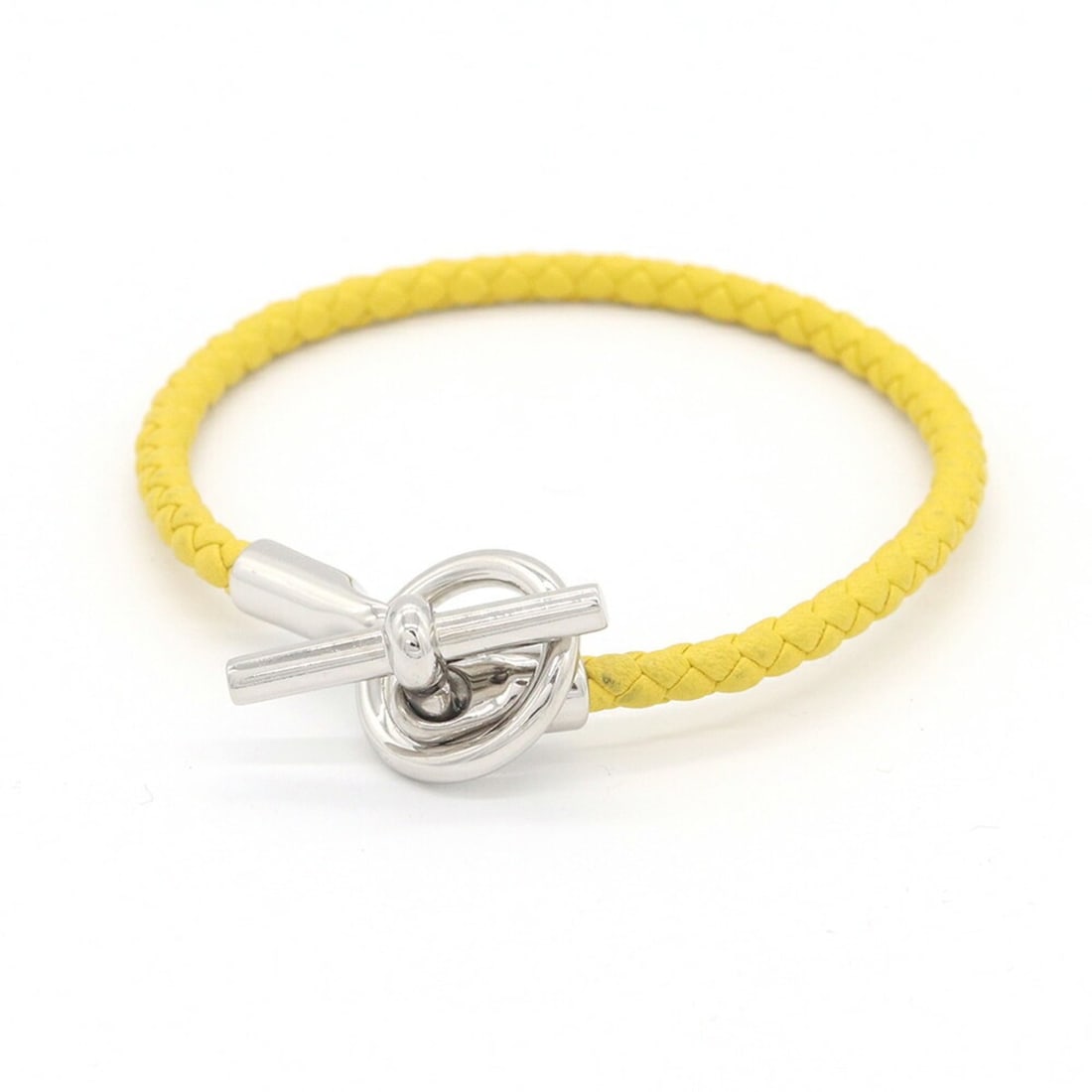 Hermes Glenan Yellow Leather Bangle Bracelet for Women: --- Catalog ---Category: SizeWidth: 3.5mm / 0.13''Length: 17cm / 6.69''Weight: 7.5g / 0.26oz.Category: DesignType: Charm braceletColor: YellowGender: WomenMaterial: LeatherCategory: GeneralBrand: Herm
