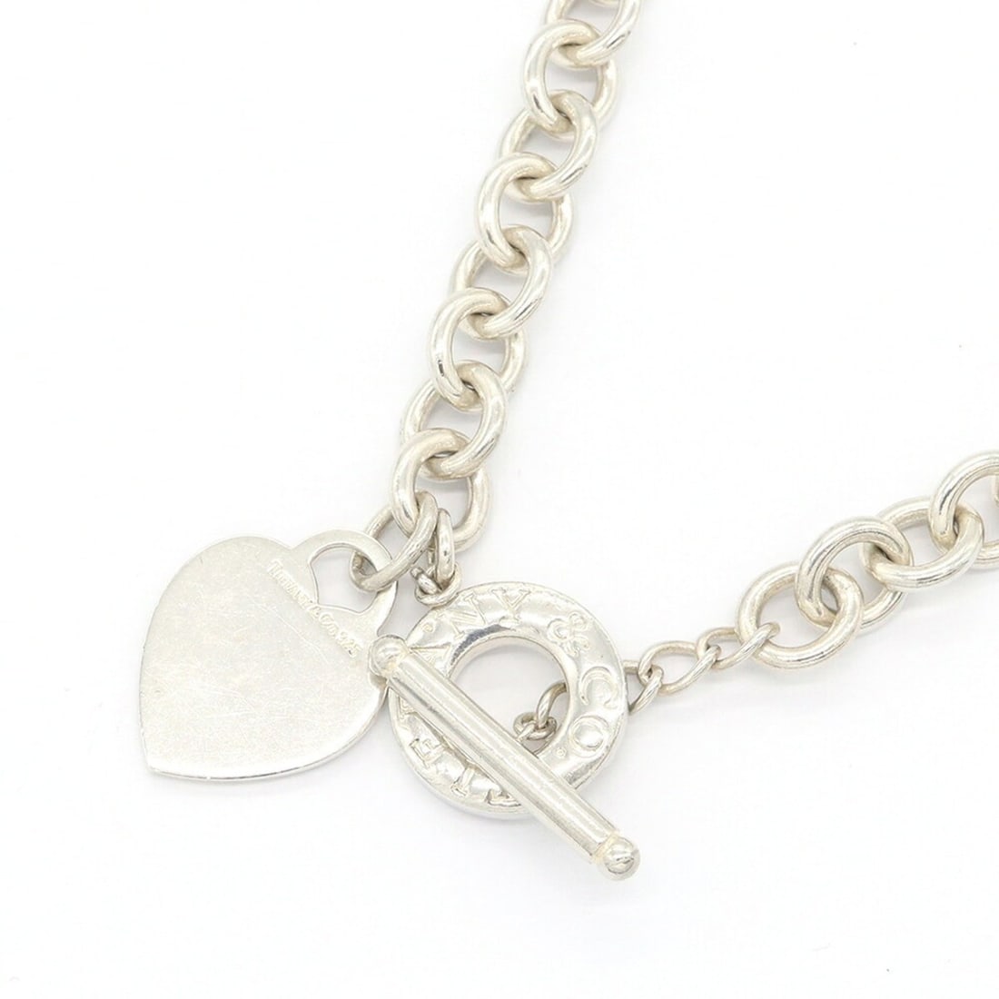Tiffany & Co. Return to Heart Tag Necklace, Sterling Silver 925, Circle Pendant Choker for Women.: --- Catalog ---Category: SizeWidth: 1mm / 0.04''Weight: 73.1g / 2.57oz.Pendant Size: 27mm x 20mm / 1.06'' x 0.78''Neck Circumference: 40 cm / 15.74''Category: DesignGender: WomenMaterial: Sterling sil