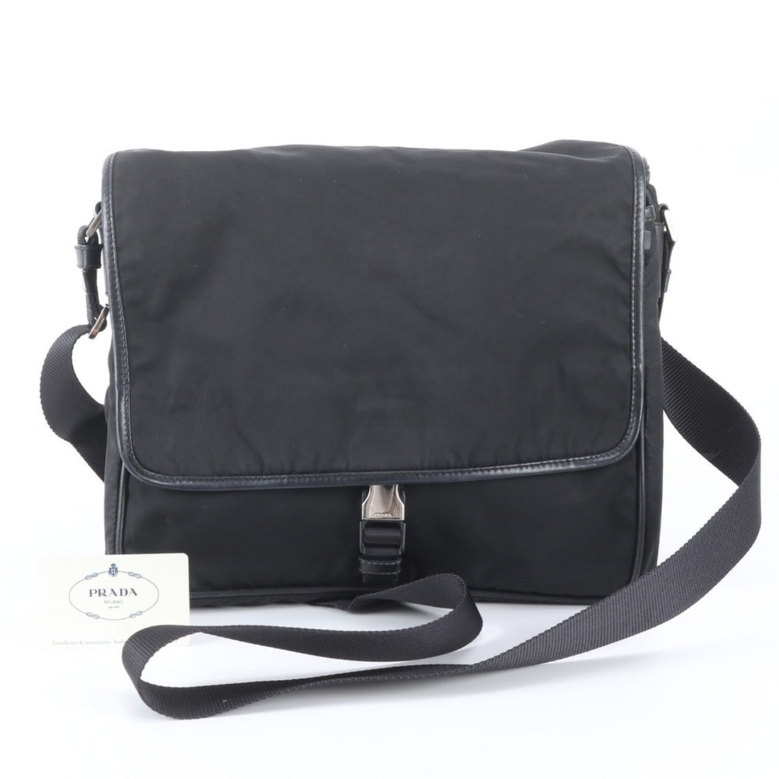 Prada Okayama Tenmaya Guarantee Included Tessuto Nylon V166 Leather Shoulder Bag for Men: --- Catalog ---Category: SizeSize (HxWxD): 28cm x 31cm x 12cm / 11.02'' x 12.2'' x 4.72''Category: DesignType: Shoulder bagColor: Black, WhiteGender: MenMaterial: Nylon , Leather Category: GeneralMPN: