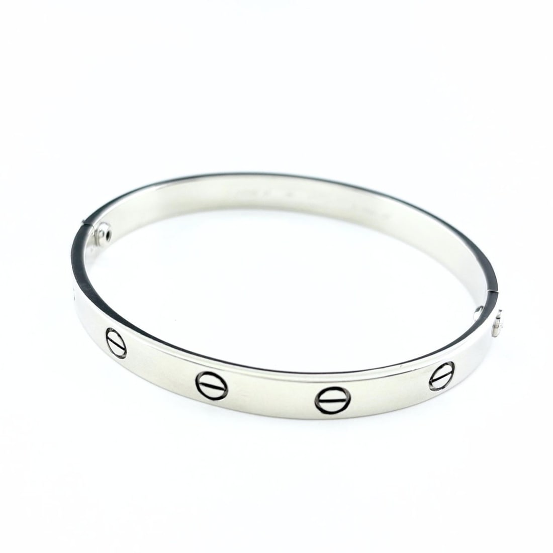 Cartier Love Bracelet, 750 series, for women.: --- Catalog ---Category: SizeLength: 16.5cm / 6.49''Category: DesignType: Charm braceletColor: SilverGender: WomenCategory: GeneralBrand: Cartier--- Item List ---Section: ConditionRanking: Rank B Used