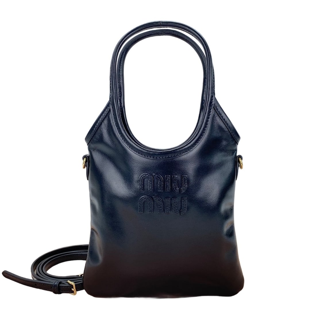 Miu Miu Miu Ivy Mini 2-Way Handbag, Black: --- Catalog ---Category: SizeSize (HxWxD): 24cm x 19cm x 1cm / 9.44'' x 7.48'' x 0.39''Category: DesignType: HandbagColor: BlackGender: WomenCategory: GeneralBrand: Miu MiuCountry of Origin: Italy--- 