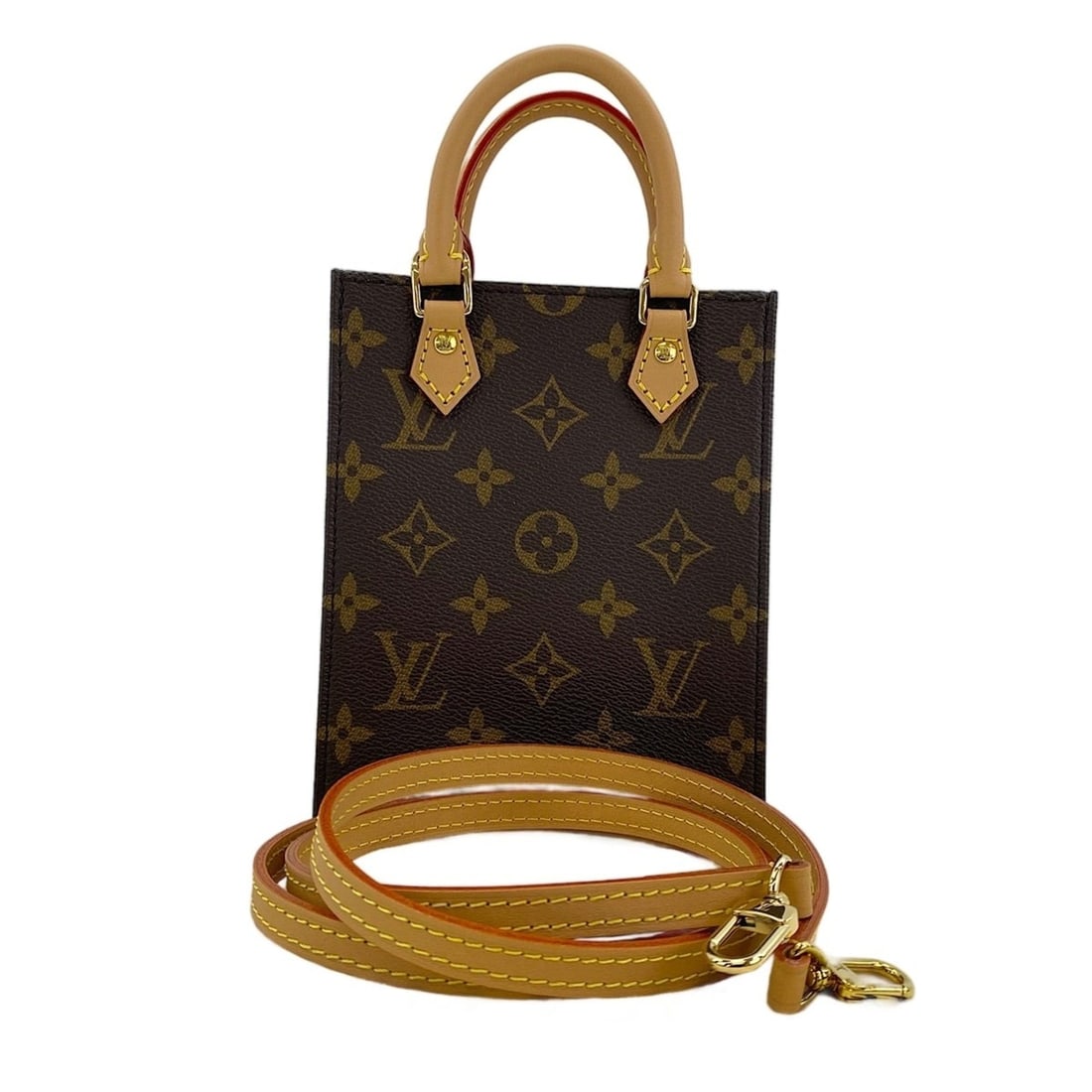 Louis Vuitton Petite Sac Plat handbag, brown.: --- Catalog ---Category: SizeSize (HxWxD): 17cm x 13.5cm x 5cm / 6.69'' x 5.31'' x 1.96''Category: DesignType: HandbagColor: BrownGender: WomenCategory: GeneralBrand: Louis Vuitton--- Item List ---Sec