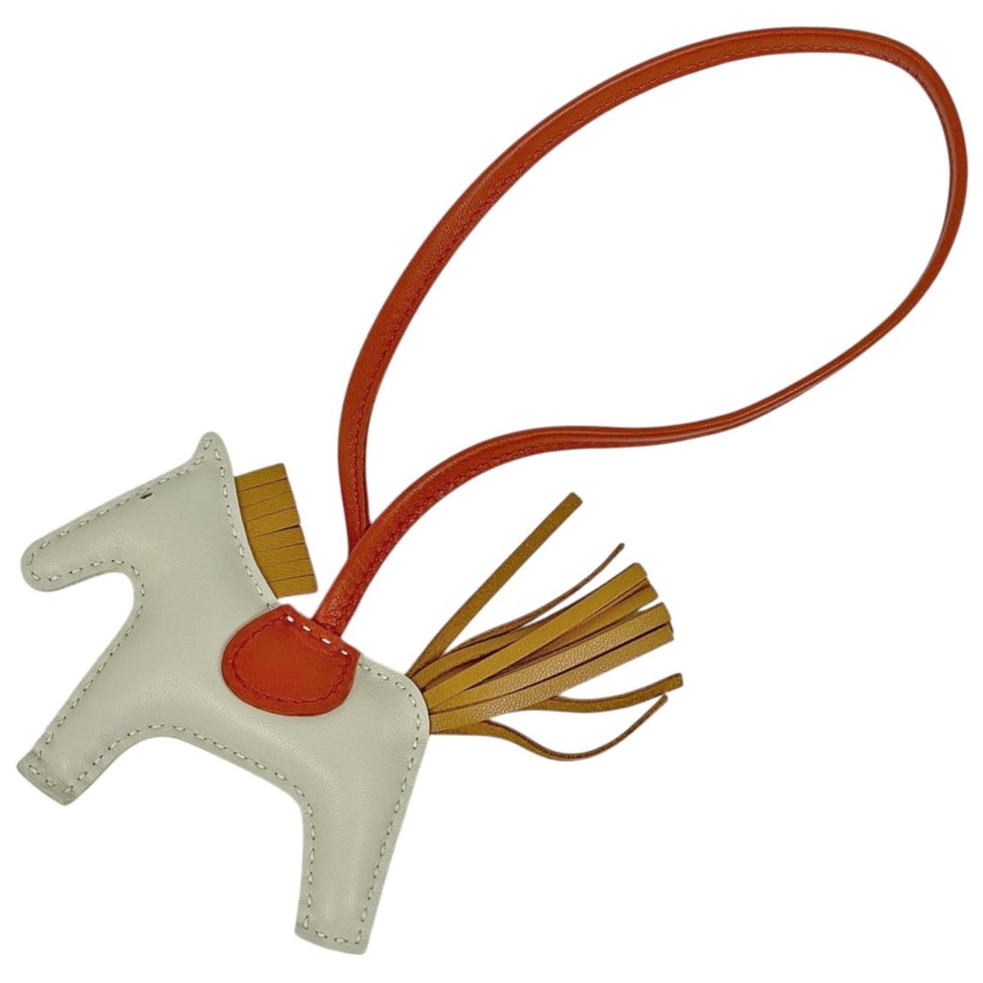 Hermes Rodeo PM Strap Bag Charm, Leather, White/Orange, Women's: --- Catalog ---Category: SizeStone Size (HxW): 90.00mm x 230.00mm / 3.54'' x 9.06''Category: DesignType: Handbag charmColor: Orange, WhiteGender: WomenMaterial: LeatherCategory: GeneralBrand: Hermes--