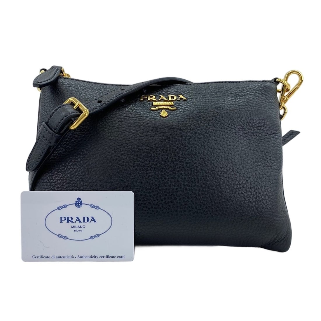 Prada Vitello Phoenix Shoulder Bag, Black: --- Catalog ---Category: SizeSize (HxWxD): 16.5cm x 23cm x 1cm / 6.49'' x 9.05'' x 0.39''Strap Length: 122cm - 132cm / 48.03'' - 51.96''Category: DesignType: Shoulder bagColor: BlackGender: WomenCateg