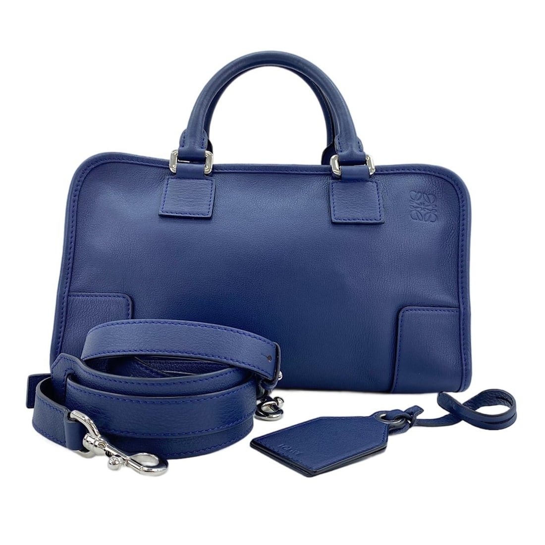 Loewe Amazona 28 2-Way Handbag, Navy: --- Catalog ---Category: SizeSize (HxWxD): 17cm x 29cm x 14cm / 6.69'' x 11.41'' x 5.51''Category: DesignType: HandbagColor: NavyGender: WomenCategory: GeneralBrand: LoeweCountry of Origin: Spain--- I