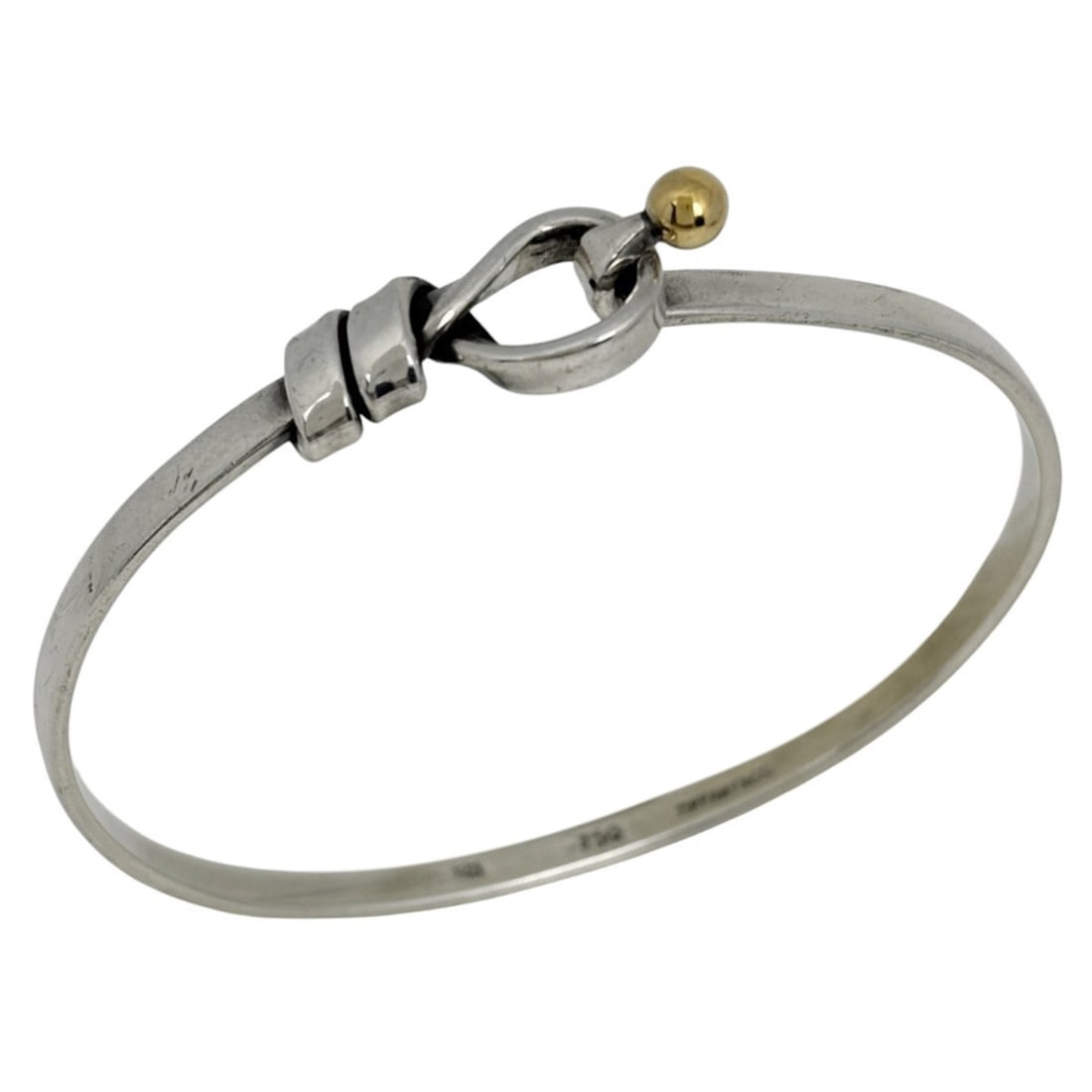 Tiffany & Co. Hook Eye Bangle Bracelet, Love Knot, Sterling Silver 925/750, Silver, Women's: --- Catalog ---Category: SizeLength: 16.5cm / 6.49''Category: DesignType: BangleColor: SilverGender: WomenMaterial: Gold (18K), Silver 925Category: GeneralBrand: Tiffany--- Item List ---Section: Condi