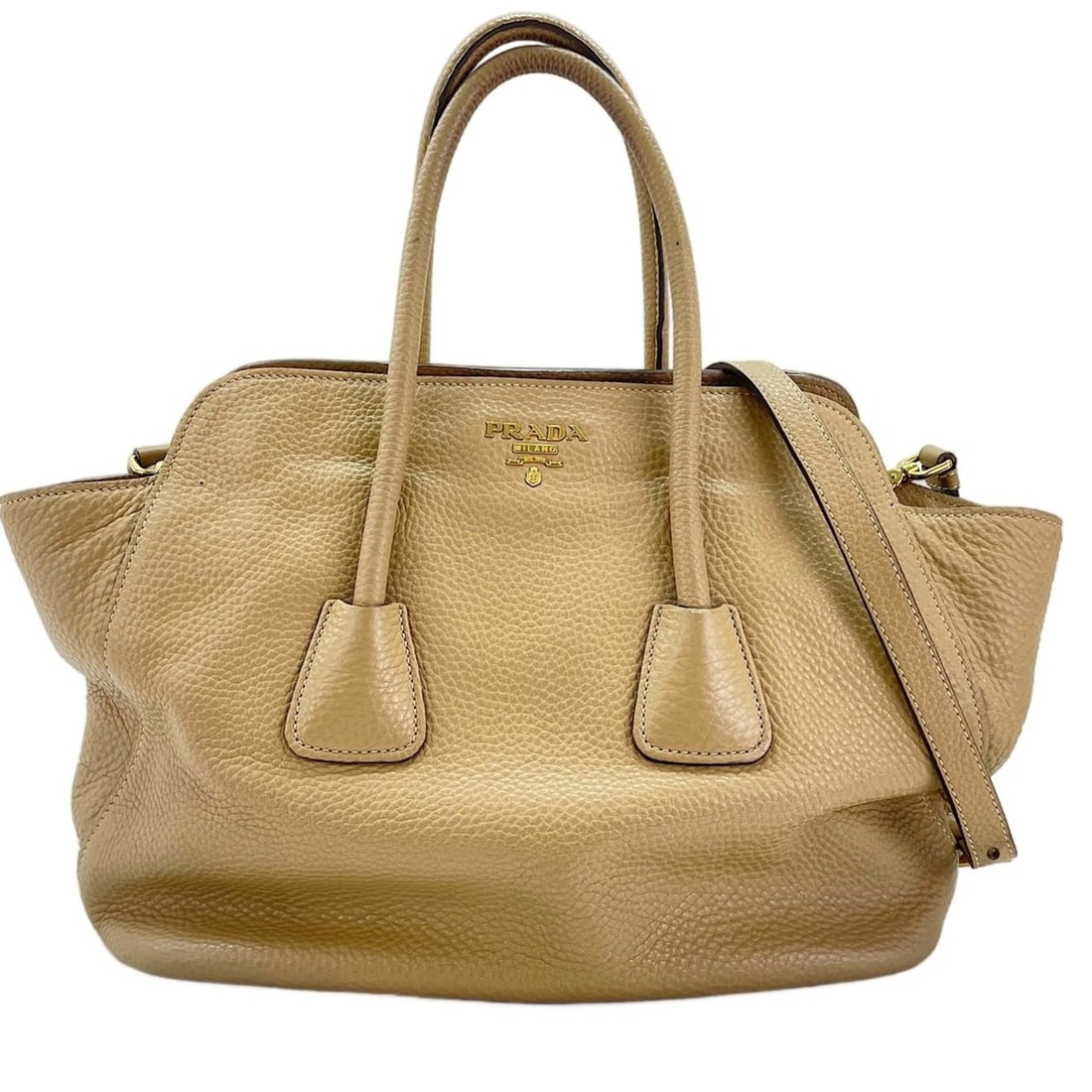 Prada 2-way tote bag, beige: --- Catalog ---Category: SizeSize (HxWxD): 27cm x 30cm x 16cm / 10.62'' x 11.81'' x 6.29''Category: DesignType: Tote bagColor: BeigeGender: Women,MenCategory: GeneralBrand: PradaCountry of Origin: Ita