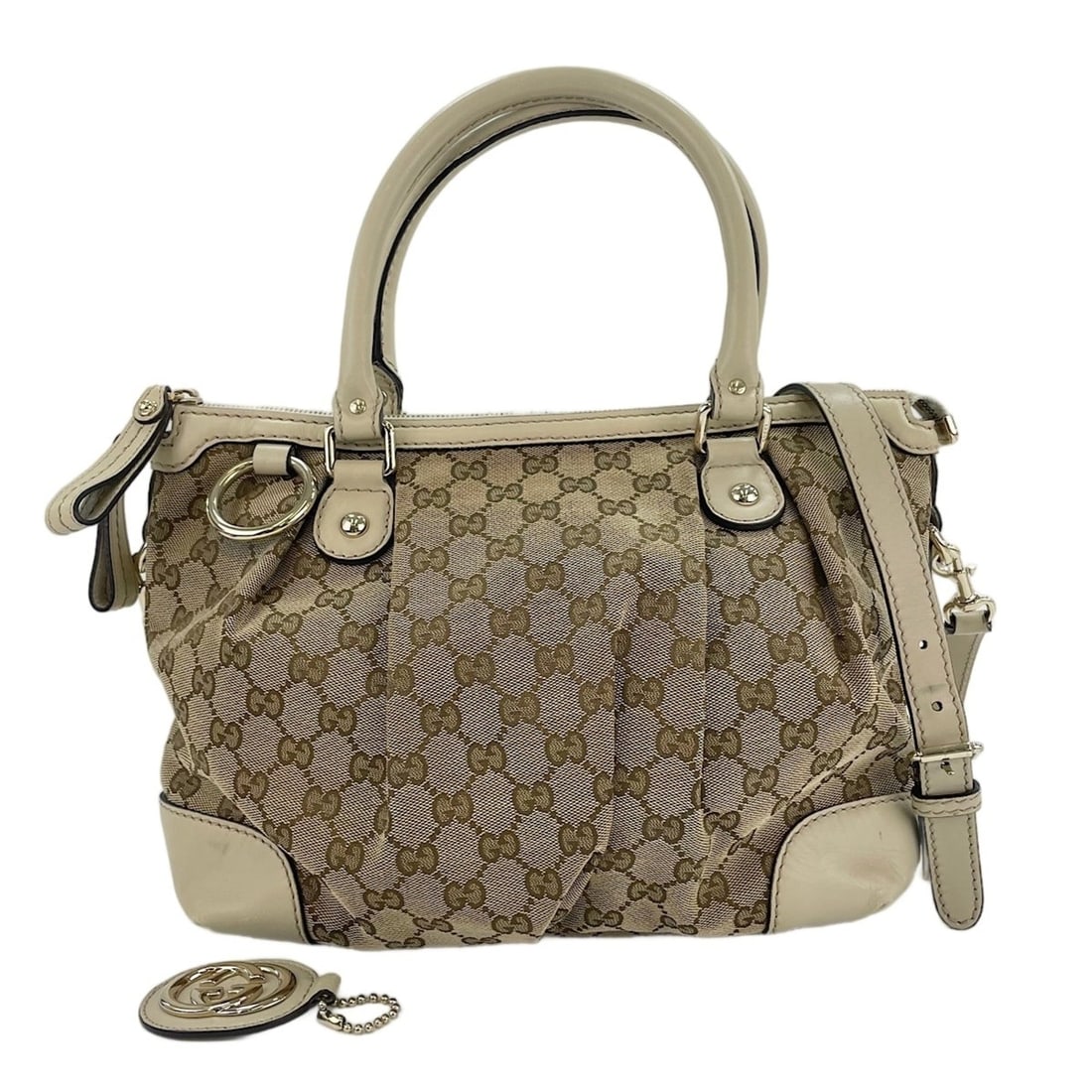 Gucci Sukey 2-Way Handbag, Beige: --- Catalog ---Category: SizeSize (HxWxD): 23cm x 35cm x 11cm / 9.05'' x 13.77'' x 4.33''Category: DesignType: HandbagColor: BeigeGender: WomenCategory: GeneralBrand: GucciCountry of Origin: Italy--- 