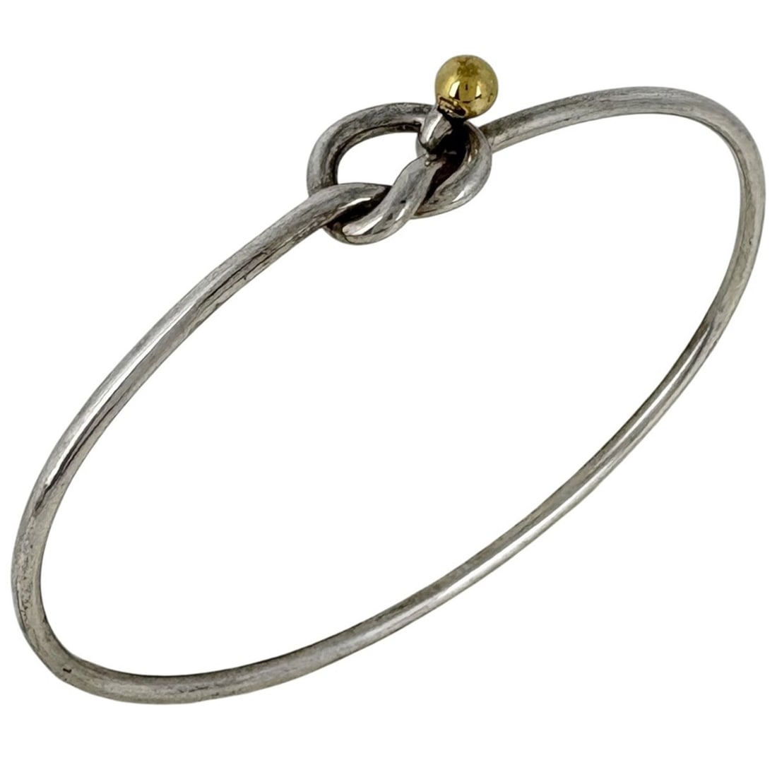 Tiffany & Co. Hook Eye Bangle Bracelet, Sterling Silver 925/750, Silver/Gold, Women's: --- Catalog ---Category: SizeLength: 16cm / 6.29''Category: DesignType: BangleColor: Gold, SilverGender: WomenMaterial: Gold (18K), Silver 925Category: GeneralBrand: Tiffany--- Item List ---Section: C