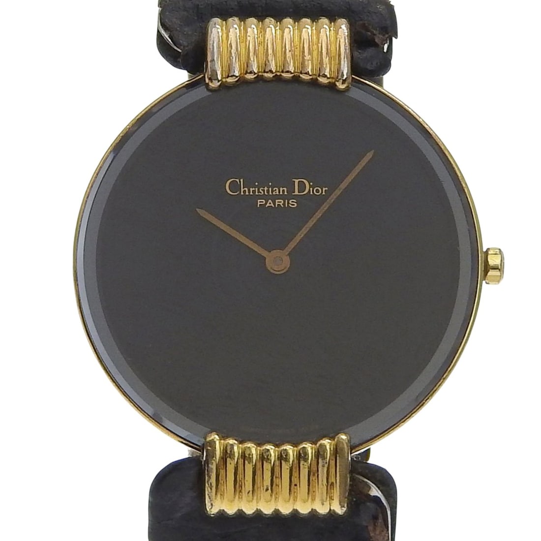 Christian Dior Bakira Watch 47.153-4 Gold Plated x Leather Strap Quartz Analog Black Dial Women's: --- Catalog ---Category: SizeWrist Size: 15cm - 19cm / 5.9'' - 7.48''Case Diameter: 30mm / 1.18''Category: DesignType: WristwatchGender: WomenColor (Dial): BlackMaterial (Band): Gold plated, LeatherMa