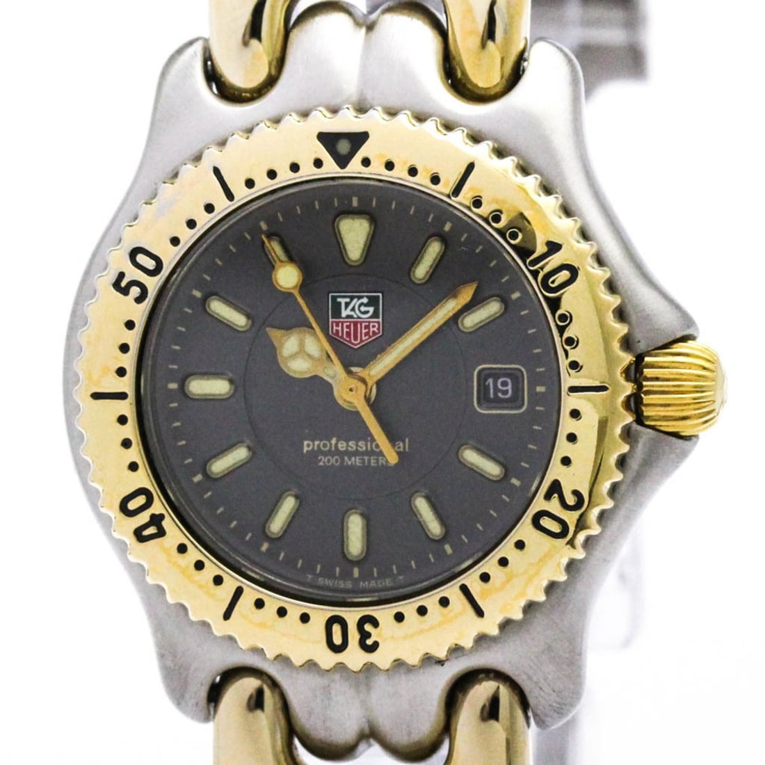 TAG HEUER Sel 200M Gold Plated Steel Ladies Watch WG1320 Polished: --- Catalog ---Category: SizeCase Diameter: 27mm / 1.06''Category: DesignType: WristwatchStyle: Dress/FormalGender: WomenColor (Dial): GrayMaterial (Band): Gold plated, Stainless steelMaterial (Case):