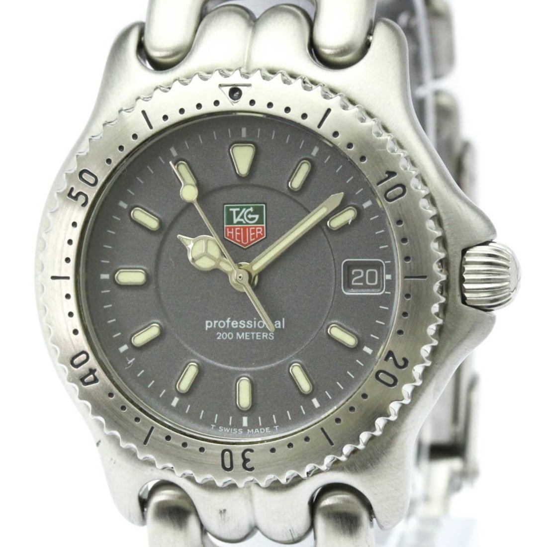 TAG HEUER Sel Professional 200M Quartz Mid Size Watch WG1213 Polished: --- Catalog ---Category: SizeCase Diameter: 34mm / 1.34''Category: DesignType: WristwatchStyle: Dress/FormalGender: MenColor (Dial): GrayMaterial (Band): Stainless steelMaterial (Case): Stainless stee