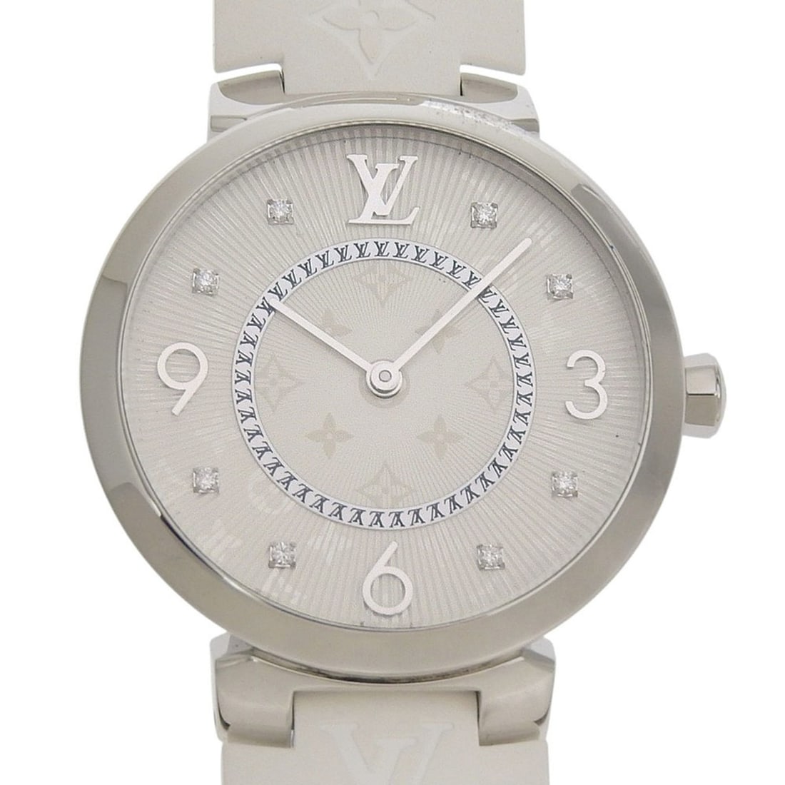 Like new Louis Vuitton Tambour MM Q13MJ white dial watch with 8 diamonds, stainless steel and rubber: --- Catalog ---Category: SizeBand Width: 18mm / 0.71''Wrist Size: 15cm - 19cm / 5.9'' - 7.48''Case Diameter: 33mm / 1.3''Category: DesignType: WristwatchGender: WomenGemstone: DiamondColor (Dial): Whi