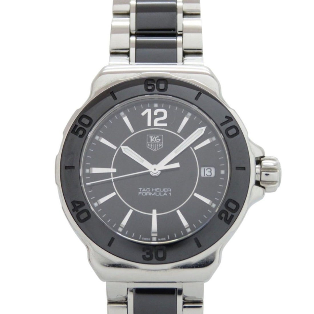 TAG Heuer Formula 1 WAH1210.BA0859 Stainless Steel Black/Silver Dial Quartz Watch 0330 HEUER: --- Catalog ---Category: SizeWrist Size: 19cm / 7.48''Case Diameter: 34mm / 1.34''Category: DesignType: WristwatchGender: WomenMaterial (Band): Stainless steelMaterial (Case): Stainless steelCategory: