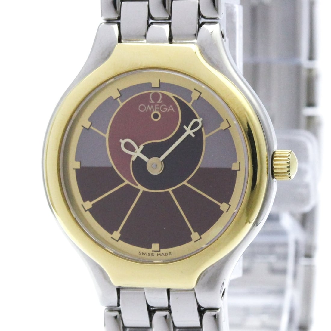 OMEGA De Ville Symbol 18K Gold Steel Quartz Ladies Watch 795.0901 Polished: --- Catalog ---Category: SizeCase Diameter: 23mm / 0.91''Category: DesignType: WristwatchStyle: Dress/FormalGender: WomenColor (Dial): Bordeaux, PurpleMaterial (Band): Stainless steelMaterial (Case): 