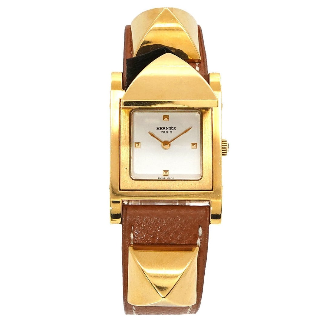 Hermes Medor Women's Watch, Pyramid Design, Gold Studs, White and Brown Leather Strap, Quartz: --- Catalog ---Category: SizeWrist Size: 13.5cm - 16.5cm / 5.31'' - 6.49''Case Diameter: 23mm / 0.91''Category: DesignType: WristwatchGender: WomenColor (Dial): WhiteMaterial (Band): Gold plated, Leat