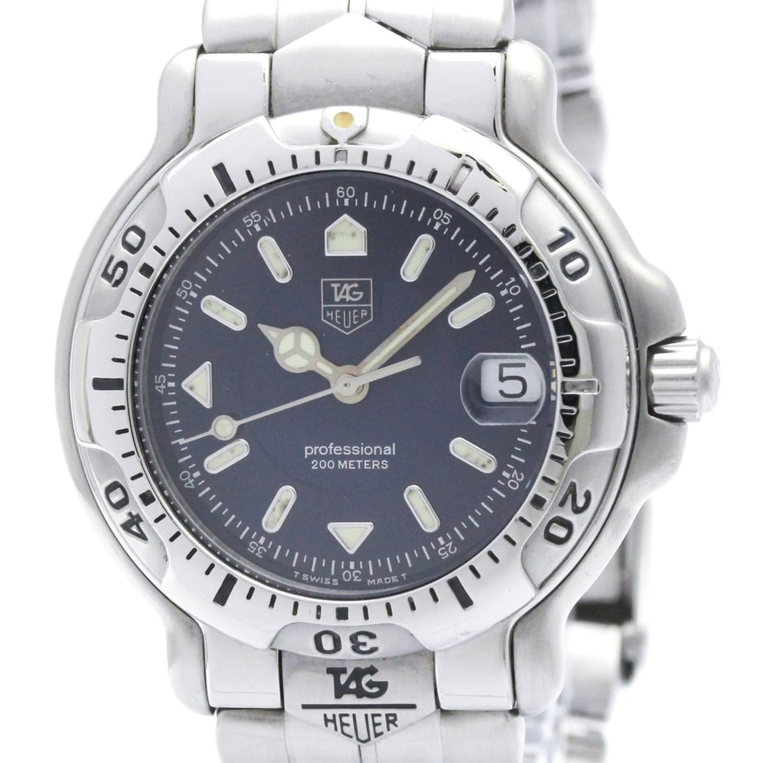 TAG HEUER 6000 Professional Quartz Mind Size Watch WH1215 Polished: --- Catalog ---Category: SizeCase Diameter: 35mm / 1.38''Category: DesignType: WristwatchStyle: SportGender: MenColor (Dial): BlueMaterial (Band): Stainless steelMaterial (Case): Stainless steelCatego
