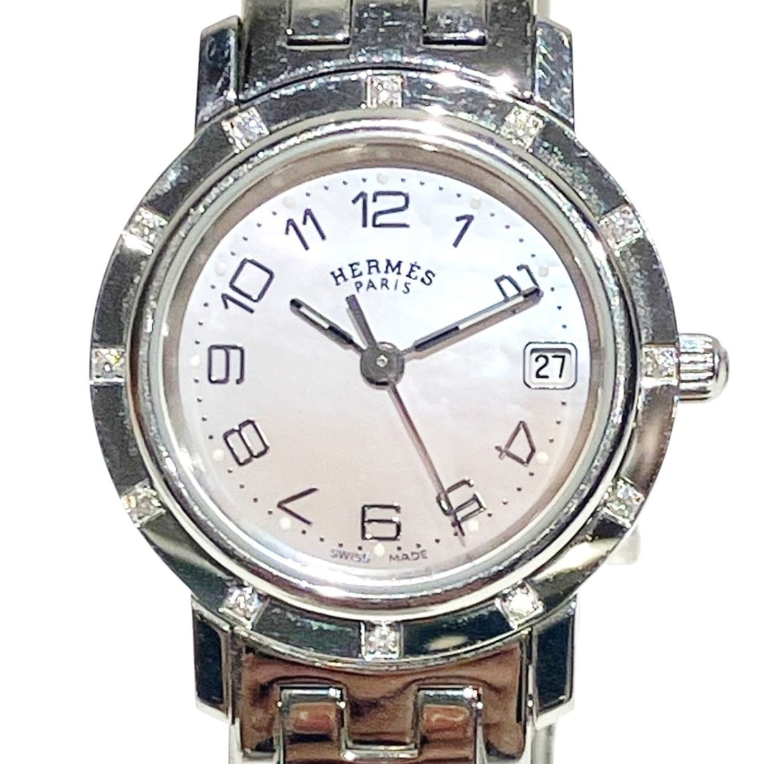 Hermes Clipper Nacre watch, total weight 42.8g, stainless steel, quartz movement, pink: --- Catalog ---Category: SizeWrist Size: 14.5cm / 5.7''Case Diameter: 24mm / 0.94''Category: DesignType: WristwatchGender: WomenColor (Dial): Pink shellMaterial (Band): Stainless steelMaterial (Case):