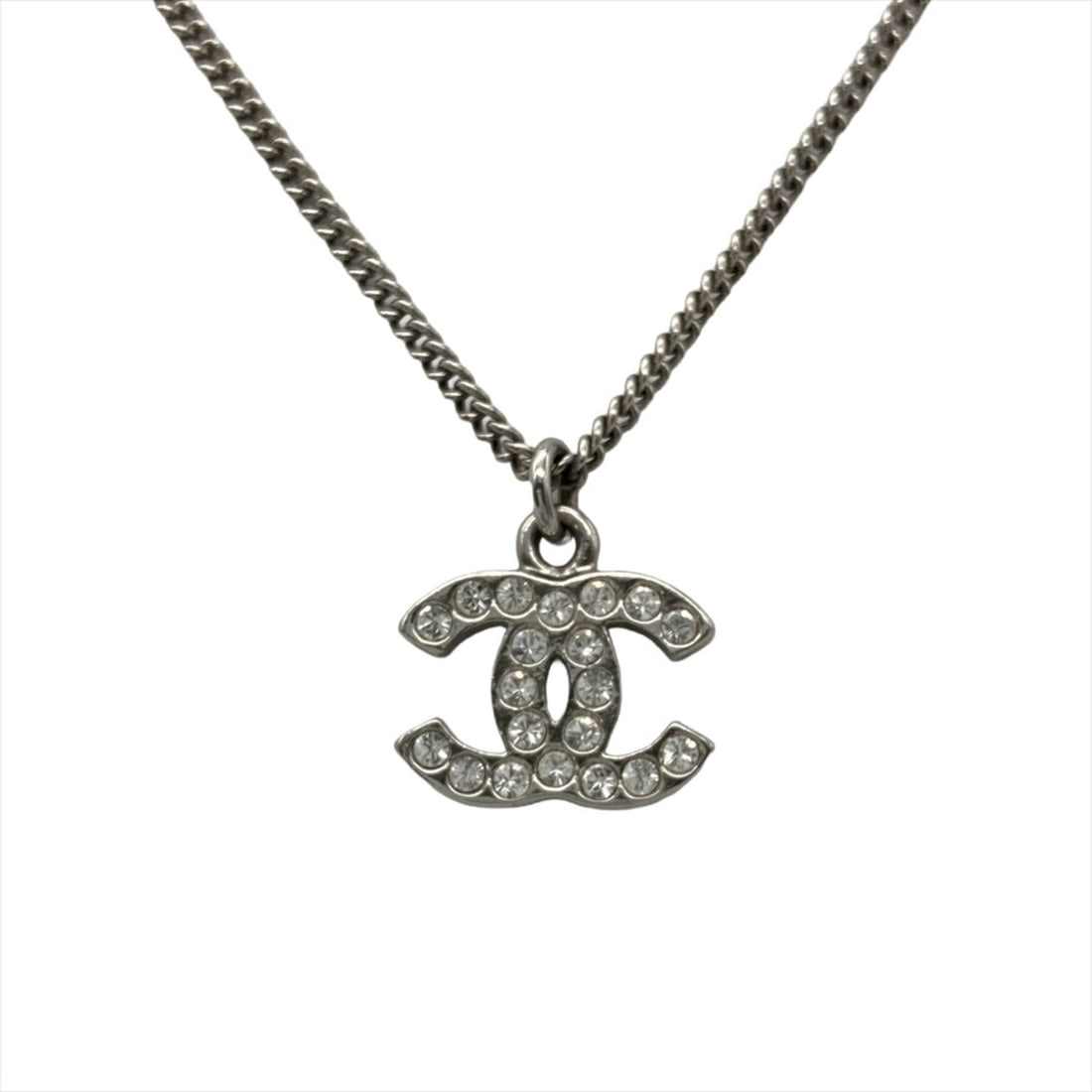 Chanel Coco Mark Rhinestone Necklace, Metal, Silver Hardware: --- Catalog ---Category: SizePendant Size: 11mm x 15mm / 0.43'' x 0.59''Neck Circumference: 42.5 cm / 16.73''Category: DesignGender: Women,MenMaterial: Metal, RhinestoneNecklace Type: NecklaceCategory