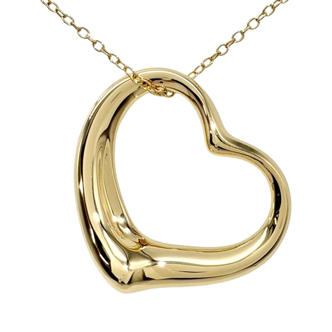 Tiffany & Co. Open Heart Large Long Necklace, 18K Yellow Gold, 14.1g, by Elsa Peretti, for Women.: --- Catalog ---Category: SizePendant Size: 30mm x 35mm / 1.18'' x 1.37''Neck Circumference: 76.5 cm / 30.11''Category: DesignGender: WomenMaterial: Yellow gold (18K)Necklace Type: NecklaceCategory: Ge