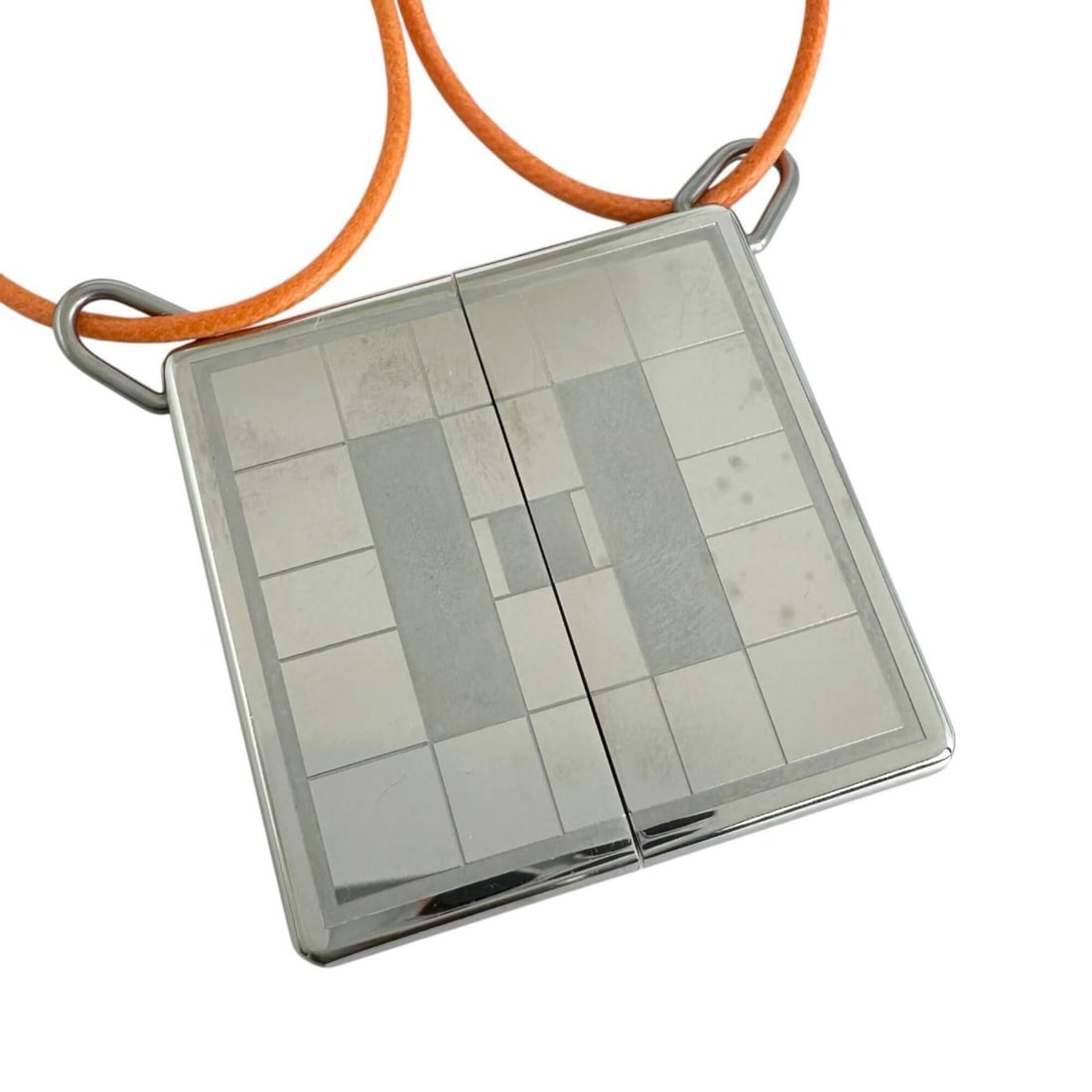 HERMES Hermes Pendant Necklace Symbol Metal Leather Orange Silver Men's Women's: --- Catalog ---Category: SizePendant Size: 35mm x 20mm / 1.37'' x 0.78''Neck Circumference: 47 cm / 18.5''Category: DesignColor: Orange, SilverGender: Men,Women,UnisexMaterial: Leather, MetalPendant T