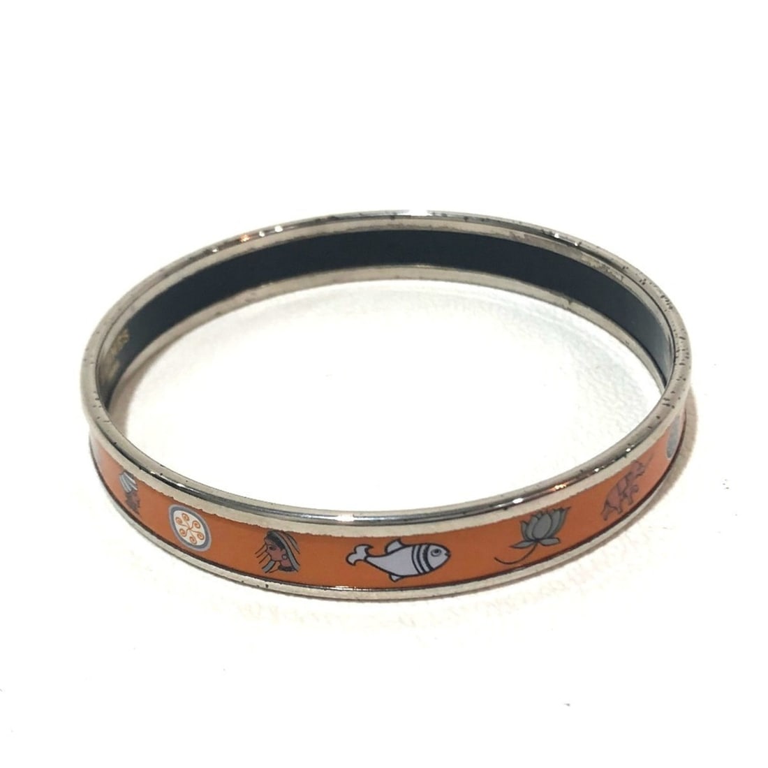 HERMES Men's Women's Enamel PM Cloisonné Bangle Bracelet Unisex Orange: --- Catalog ---Category: SizeWidth: 1cm / 0.39''Diameter: 5.8cm / 2.28''Category: DesignType: BangleColor: OrangeGender: Men,WomenMaterial: Cloisonné/enamel, MetalCategory: GeneralBrand: Hermes--- It