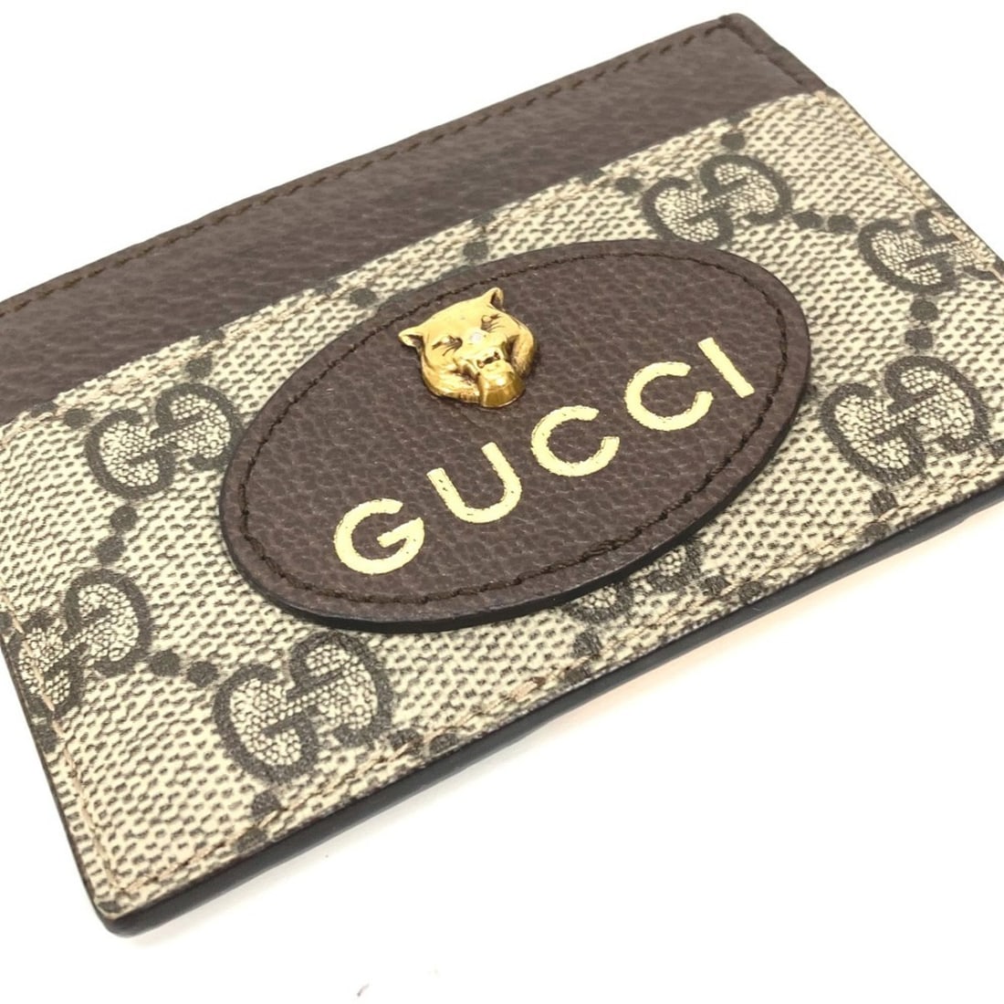 GUCCI 597557 GG Supreme Cat Head Neo Pass Case Business Card Holder Canvas Men's Brown x Yellow: --- Catalog ---Category: DesignType: Travel pass caseColor: Brown, YellowGender: MenMaterial: GG Supreme Category: GeneralBrand: GucciCategory: Physical PropertiesSize (HxWxD): 7cm x 10cm / 2.75'' x 3