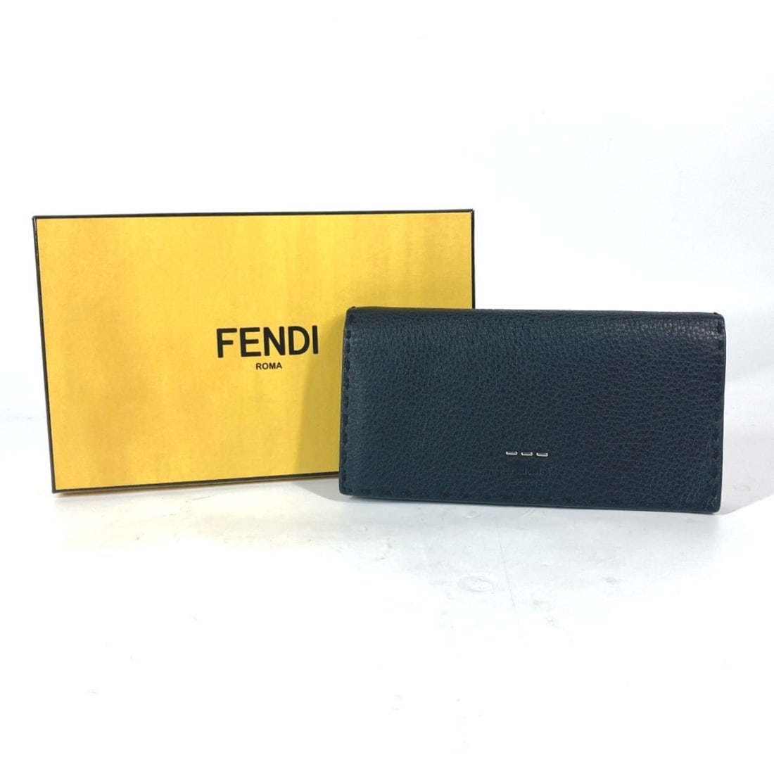 FENDI 7M0186 Stitch Selleria Bi-fold Long Wallet Leather Men's Women's Black E-240918-15: --- Catalog ---Category: SizeSize (HxWxD): 9.5cm x 18.5cm / 3.74'' x 7.28''Category: DesignType: Long wallet (bi-fold)Color: BlackGender: Men,WomenMaterial: Leather Category: GeneralBrand: Fendi--- It