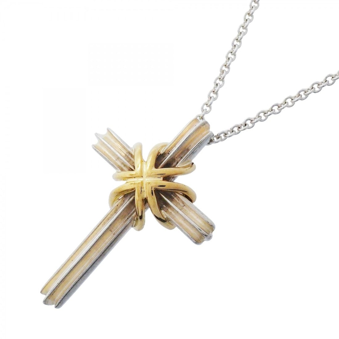 Tiffany & Co. Signature Cross Necklace, 18K Yellow Gold (KYG), Sterling Silver 925, Women's: --- Catalog ---Category: SizePendant Size: 32.9mm x 22.2mm / 1.29'' x 0.87''Neck Circumference: 46.5 cm / 18.3''Category: DesignGender: WomenMaterial: Silver 925, Yellow gold (18K)Necklace Type: Neckl