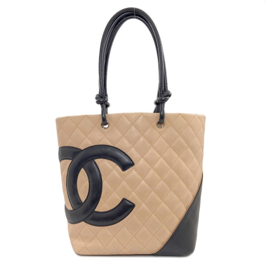 Chanel Cambon Line Tote Bag, Silver Hardware, Calfskin, Women's.: --- Catalog ---Category: SizeSize (HxWxD): 24.5cm x 20cm x 12cm / 9.64'' x 7.87'' x 4.72''Category: DesignType: Tote bagColor: Beige, BlackGender: WomenMaterial: Leather Category: GeneralBrand: Chanel