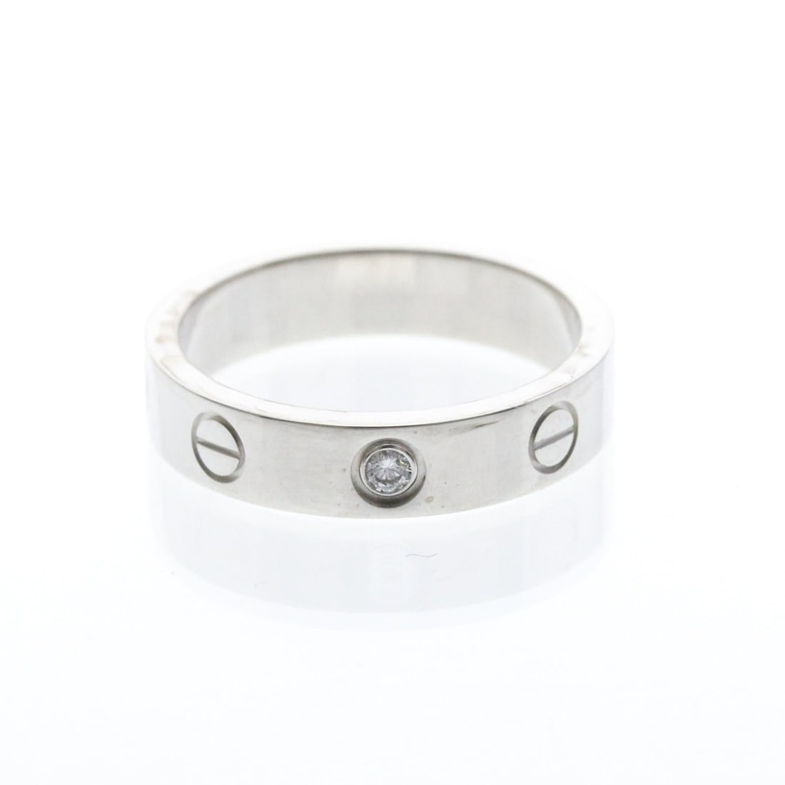 Cartier Mini Love Ring B4050500 White Gold (18K) Fashion No Stone Band Ring Silver: --- Catalog ---Category: SizeWidth: 3.9mm / 0.15''Weight: 4.6g / 0.16oz.JP Size: 9US Size: 4 3/4Brand Size: 49Category: DesignType: Band ringColor: SilverMetal: White GoldStone: No StoneStyle: Fashion