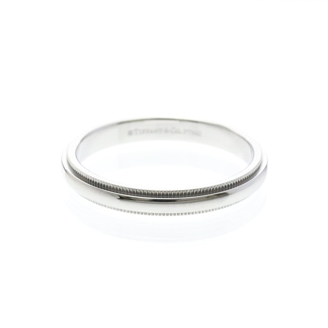 Tiffany Milgrain Ring Platinum Fashion No Stone Band Ring Silver: --- Catalog ---Category: SizeWidth: 3.2mm / 0.13''Weight: 6.6g / 0.23oz.JP Size: twenty oneUS Size: 10Category: DesignType: Band ringColor: SilverMetal: PlatinumStone: No StoneStyle: FashionGender: Me
