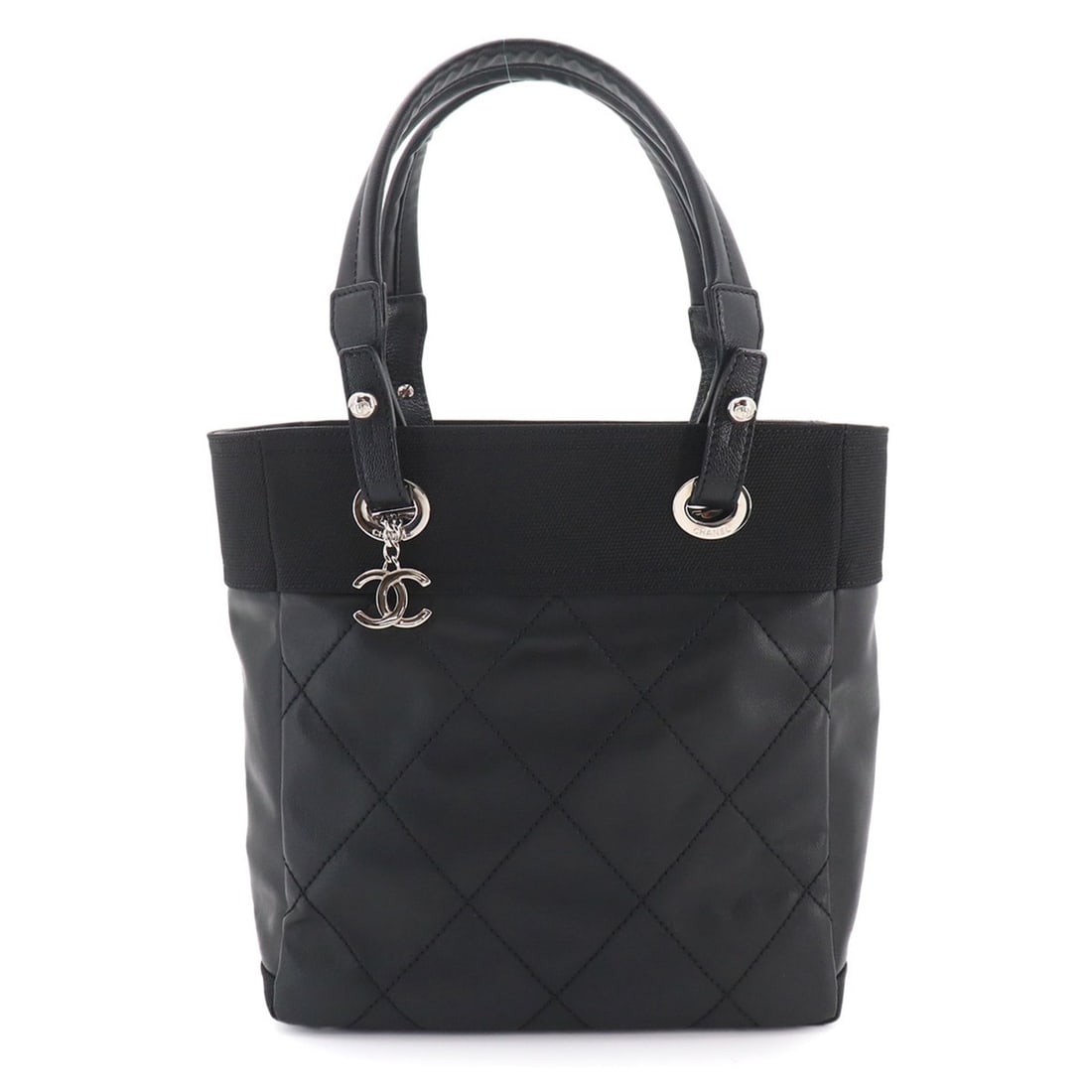 Chanel Paris Biarritz PM Tote Handbag, Nylon and Leather, Black, A34208, Silver Hardware: --- Catalog ---Category: SizeSize (HxWxD): 27cm x 25.5cm x 11cm / 10.62'' x 10.03'' x 4.33''Category: DesignType: Handbag, Tote bagColor: BlackGender: WomenMaterial: Nylon , PVC , Leather Category: Ge