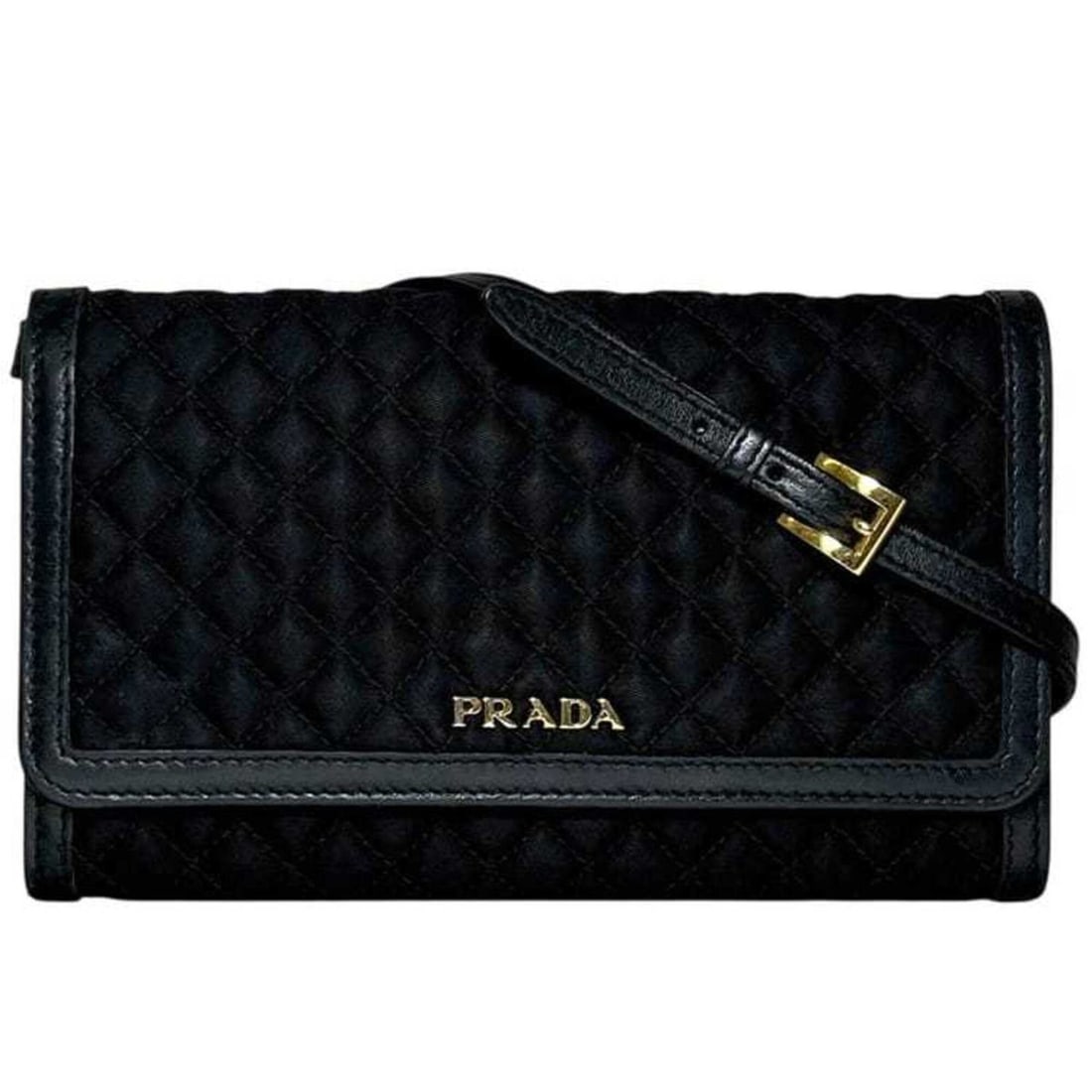 Prada Shoulder Bi-fold Long Wallet Black NERO 1M1437 Nylon Leather Quilted 12 N PRADA: --- Catalog ---Category: SizeSize (HxWxD): 10.5cm x 17cm x 3cm / 4.13'' x 6.69'' x 1.18''Strap / Chain Length: 1.22m / 48.03''Category: DesignType: Chain/Shoulder walletColor: Black, NeroGender: Women