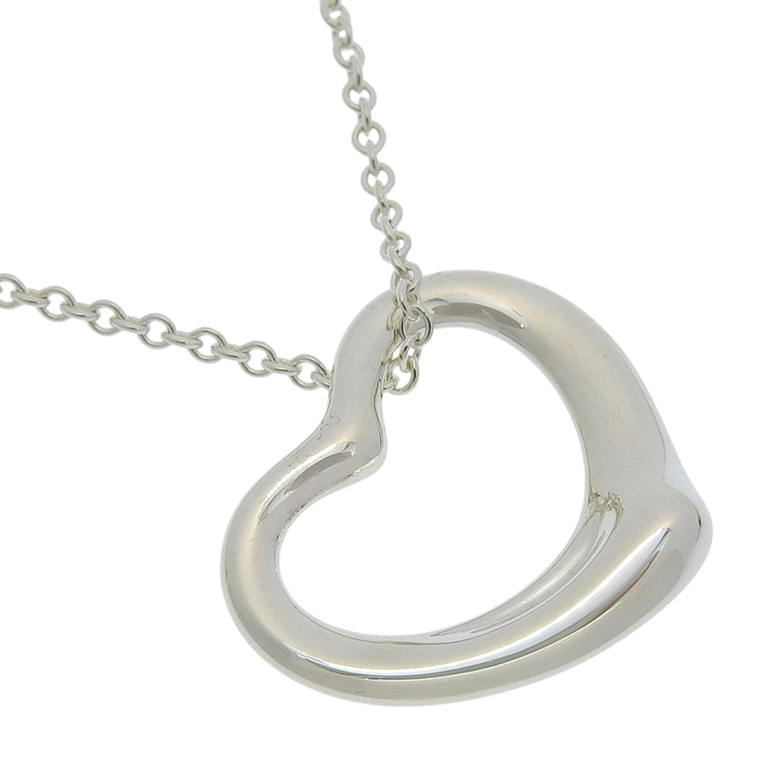Tiffany & Co. Open Heart Necklace, designed by Elsa Peretti, 925 Sterling Silver, approx. 6.4g, for: --- Catalog ---Category: SizePendant Size: 19mm x 22mm / 0.74'' x 0.86''Neck Circumference: 40.5 cm / 15.94''Category: DesignGender: WomenMaterial: Silver 925Necklace Type: NecklaceCategory: GeneralBr