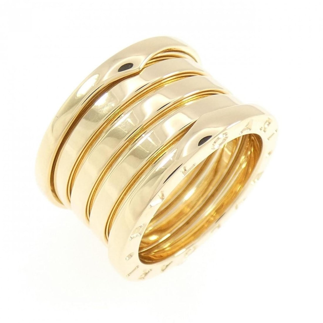 Bvlgari B.zero1 5-band ring: --- Catalog ---Category: SizeUS Size: 6.5Brand Size: 53Category: DesignType: Band ringGender: WomenMaterial: Yellow gold (18K)Category: GeneralBrand: Bvlgari--- Item List ---Section: