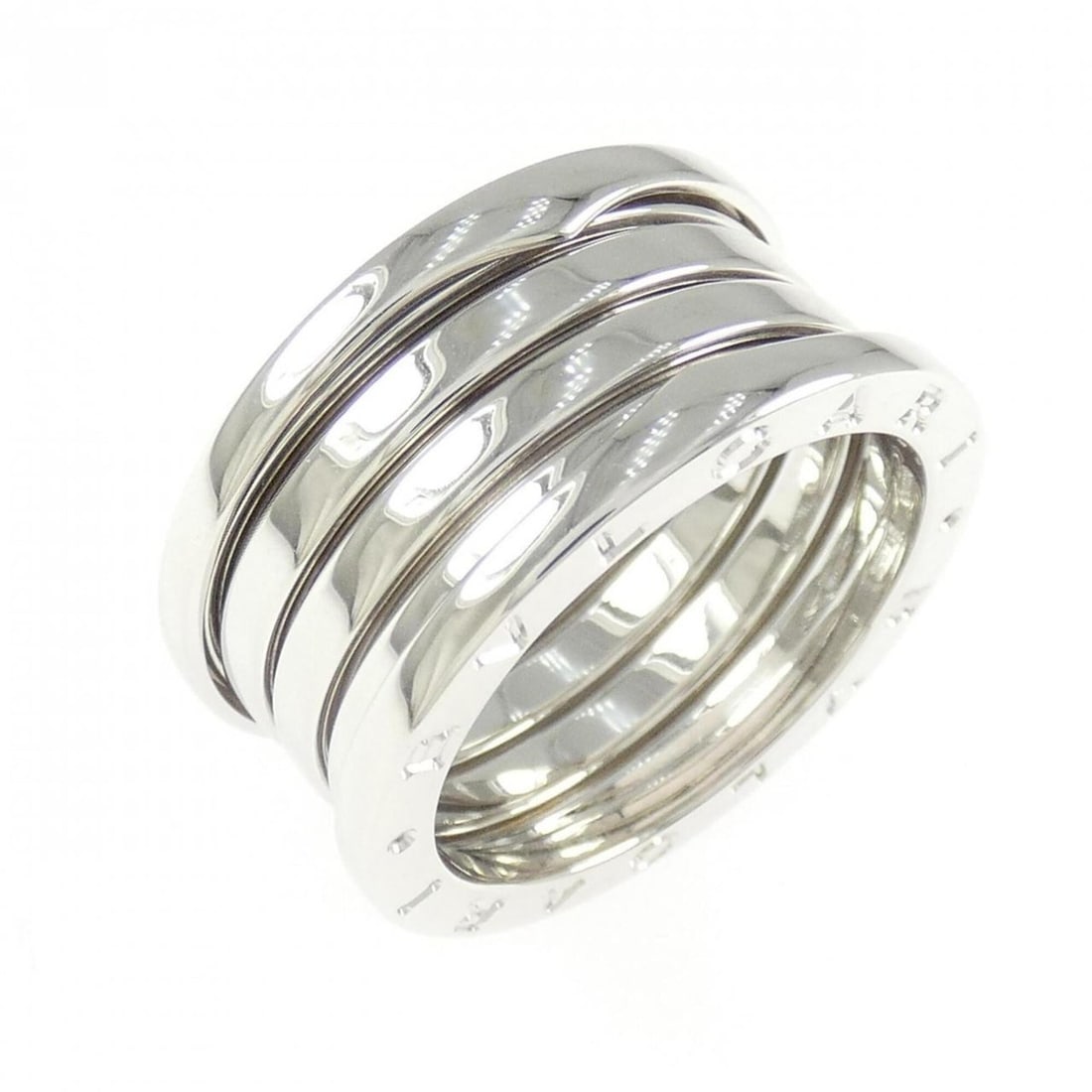 Bvlgari B.zero1 4-band ring: --- Catalog ---Category: SizeUS Size: 9Brand Size: 58Category: DesignType: Band ringGender: Women,MenMaterial: White gold (18K)Category: GeneralBrand: Bvlgari--- Item List ---Section: