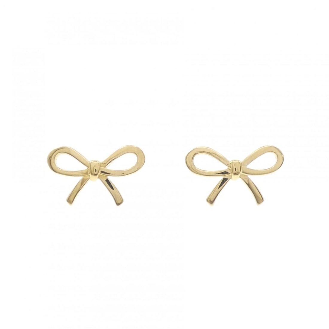 Tiffany Bow Earrings: --- Catalog ---Category: SizeSize (HxWxD): 8.40mm x 13.40mm / 0.33'' x 0.53''Category: DesignType: Stud earringsGender: WomenMaterial: Yellow gold (18K)Category: GeneralBrand: Tiffany--- Item List