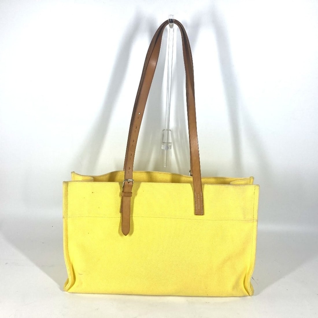 HERMES Etrivier Elan Tote Bag Shoulder Leather Canvas Women's Yellow D-241018-16: --- Catalog ---Category: SizeSize (HxWxD): 25cm x 42.5cm x 13cm / 9.84'' x 16.73'' x 5.11''Category: DesignType: Shoulder bag, Tote bagColor: YellowGender: WomenMaterial: Leather , Canvas Category: Ge